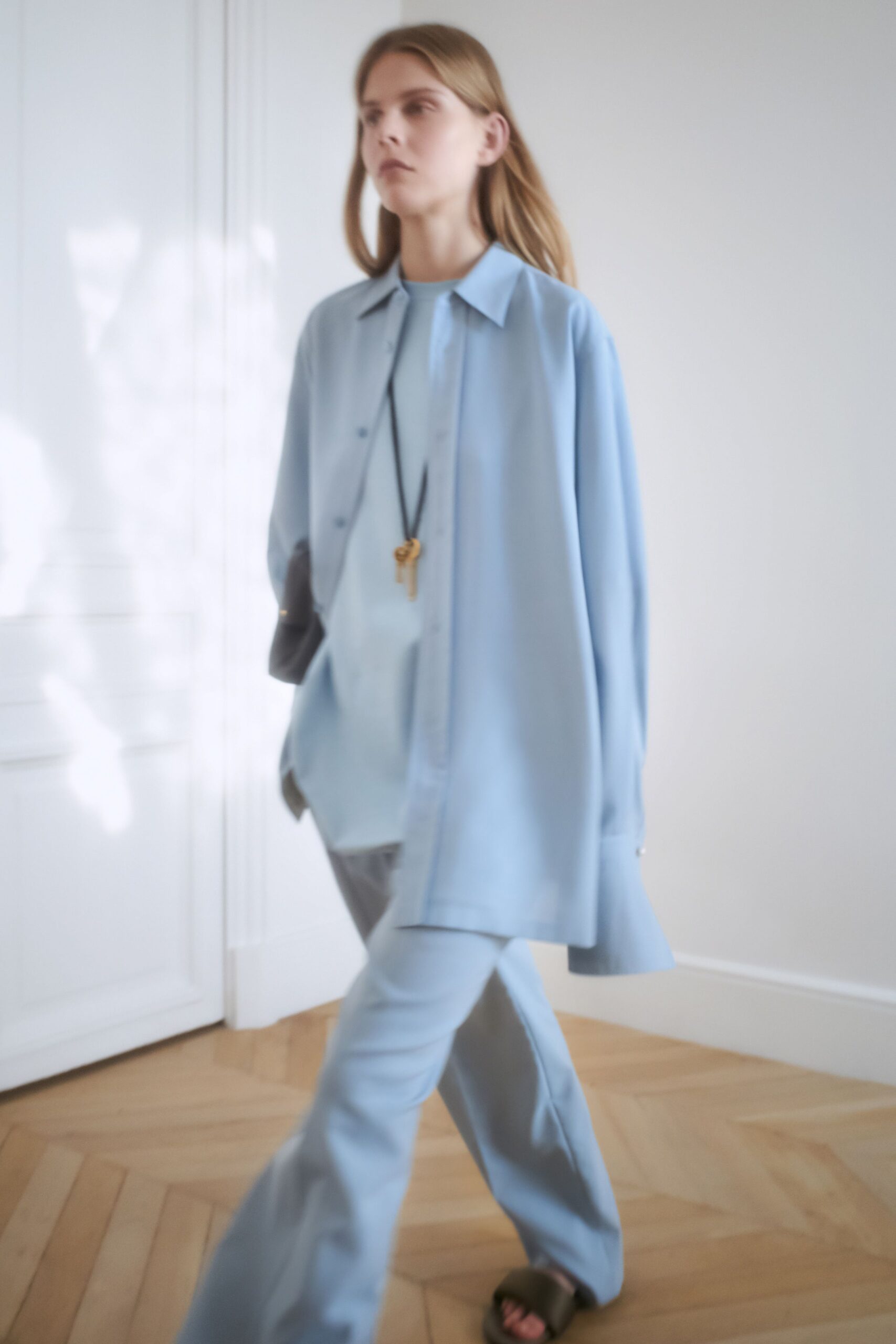 blue oversized shirt and relaxed pants