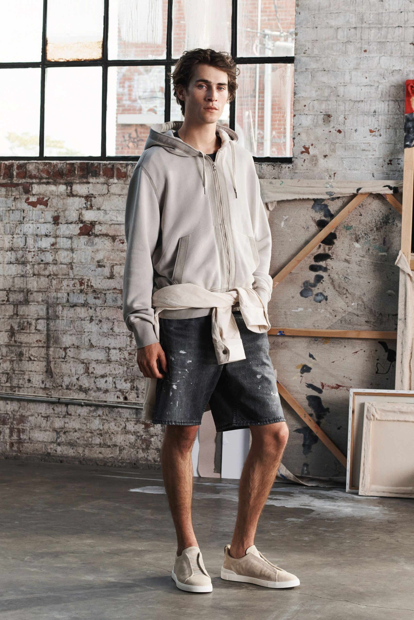 gray hoodie with denim shorts