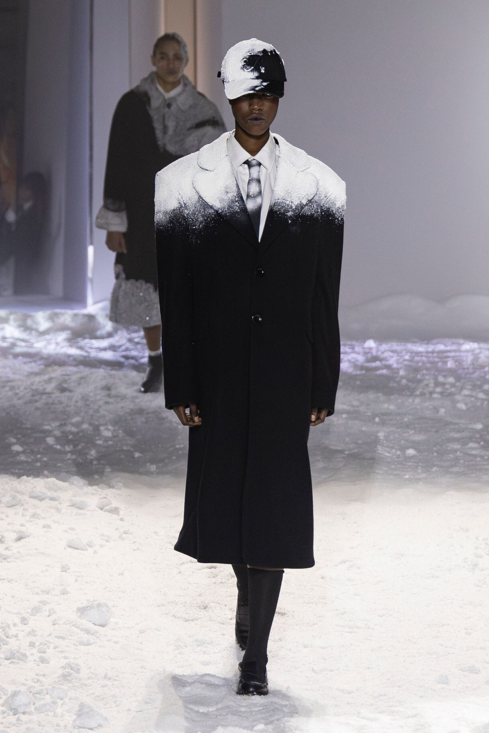 black wool long-sleeve collared oversized buttoned layered coat