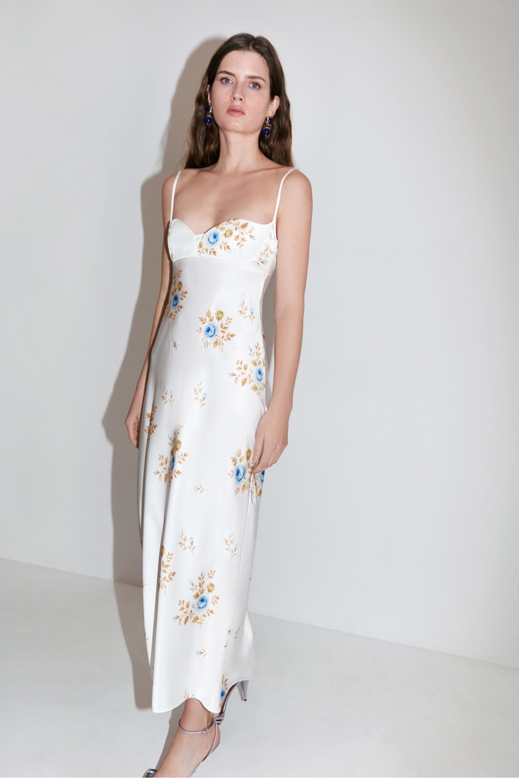 white floral midi dress with silver shoes