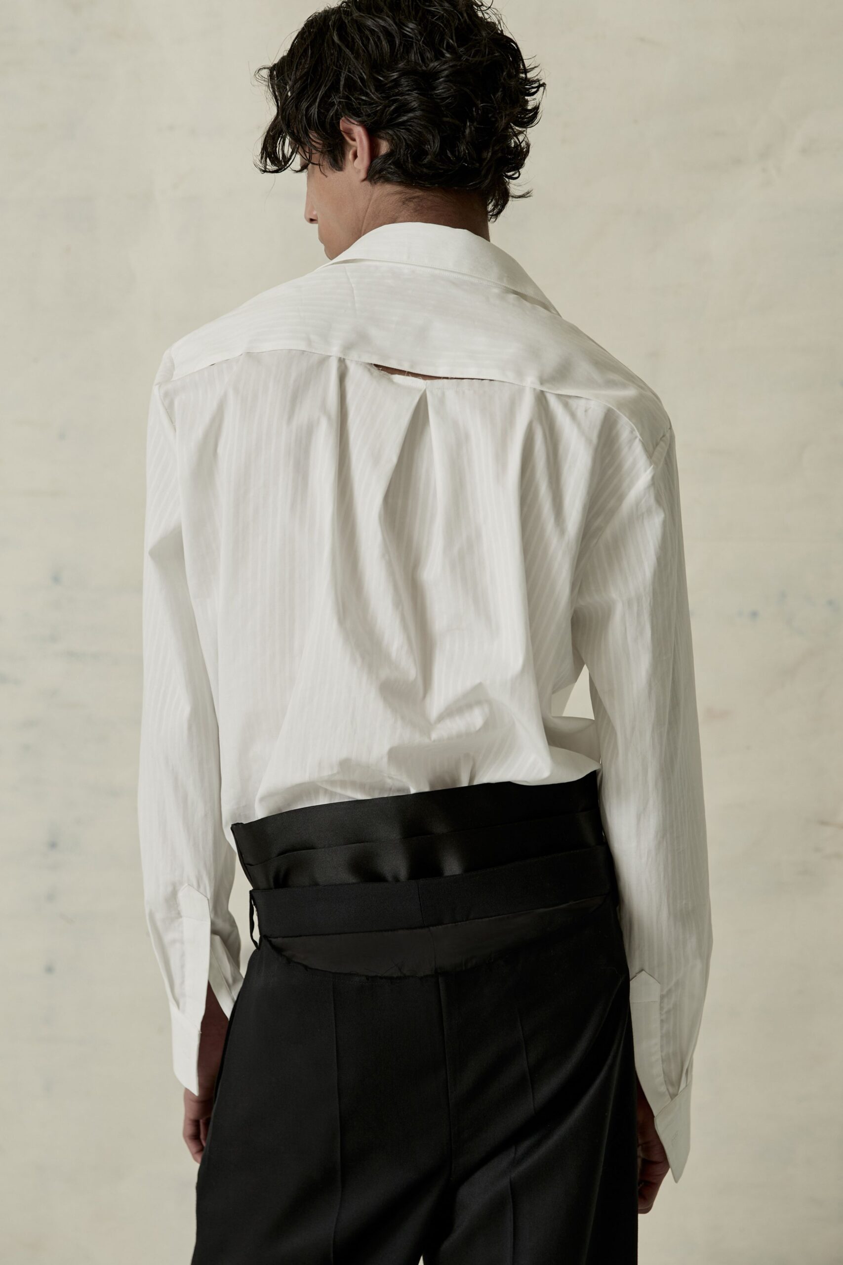 white striped shirt and black pants