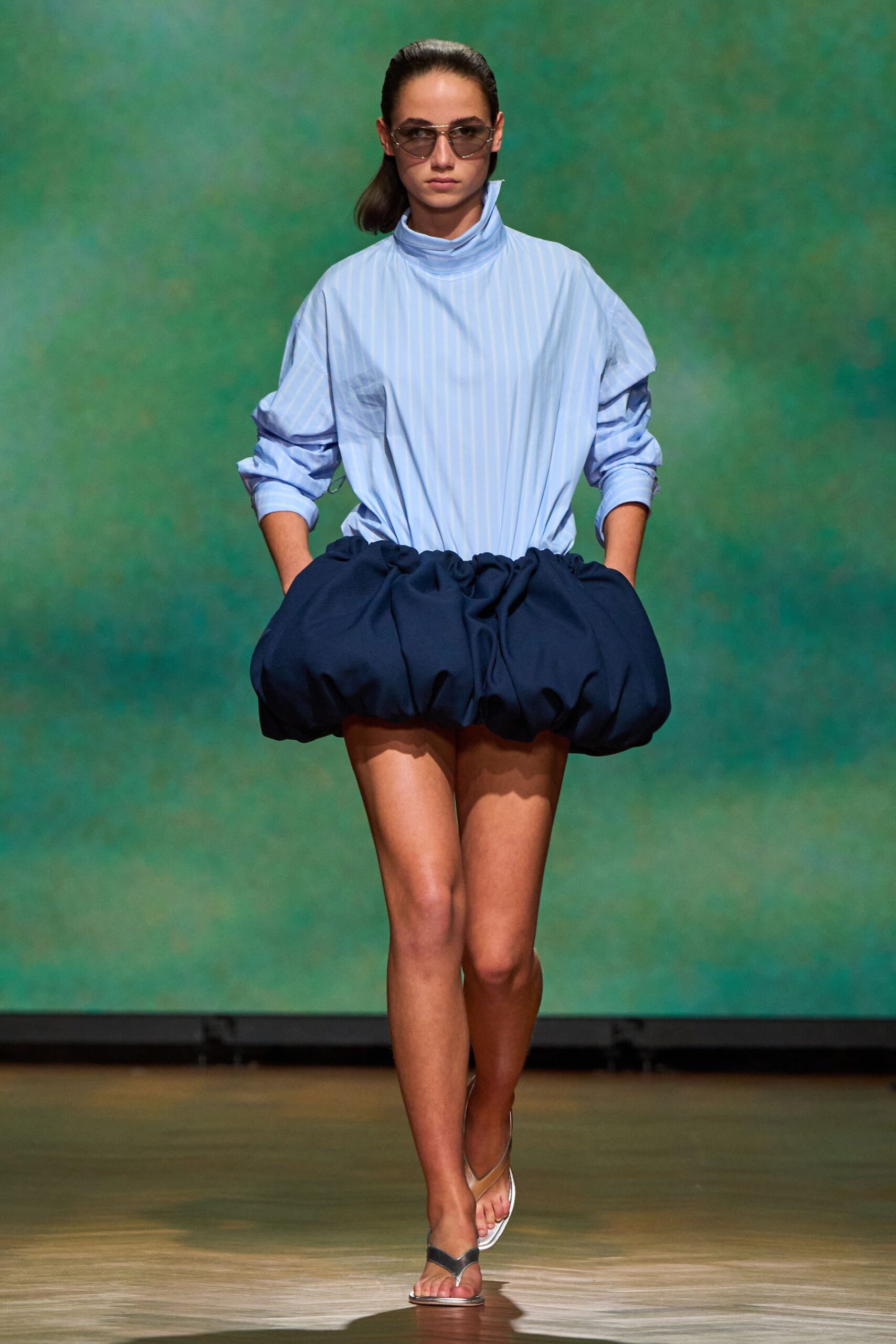 blue striped top with navy skirt
