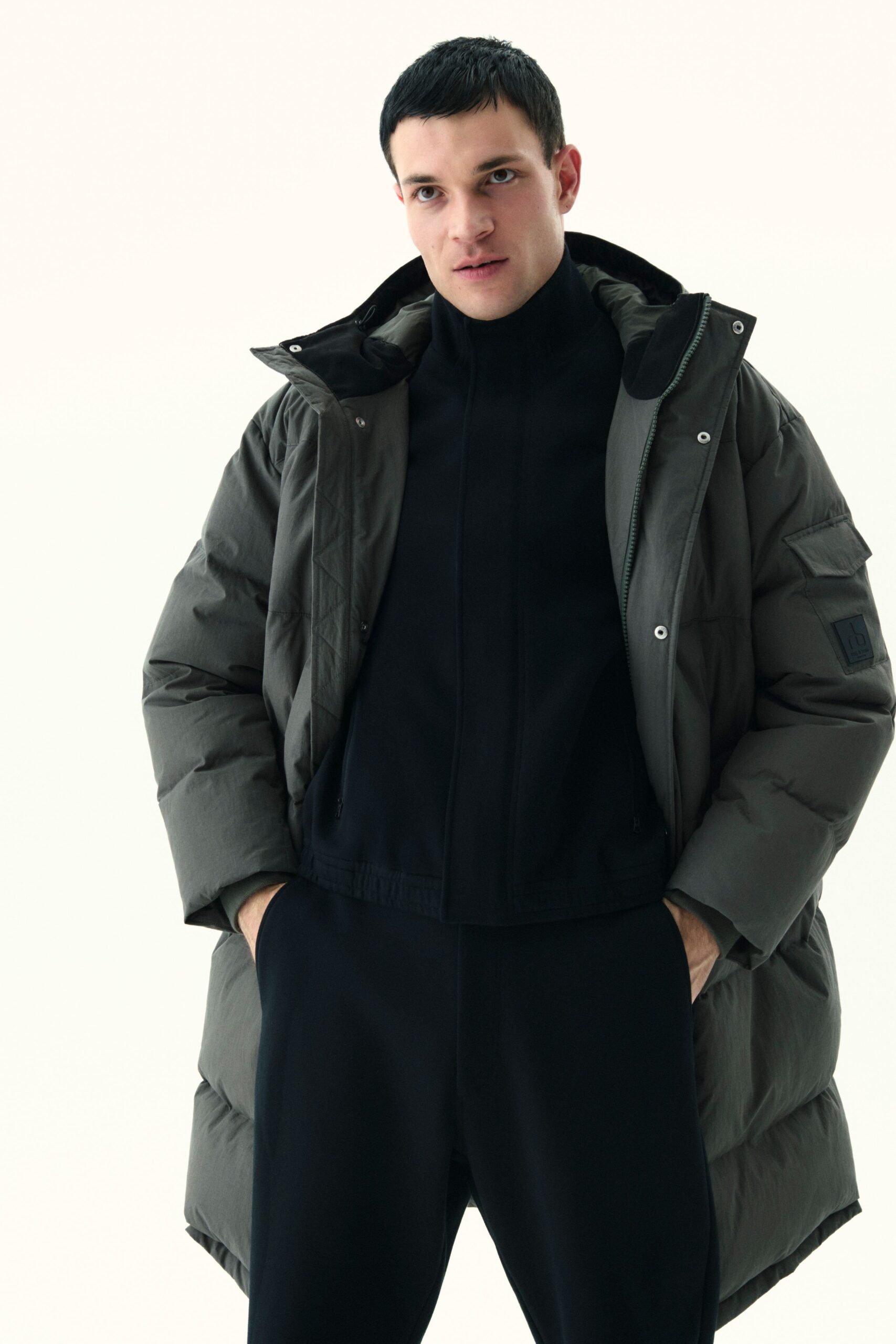 black cotton long-sleeve high-neck fitted jacket