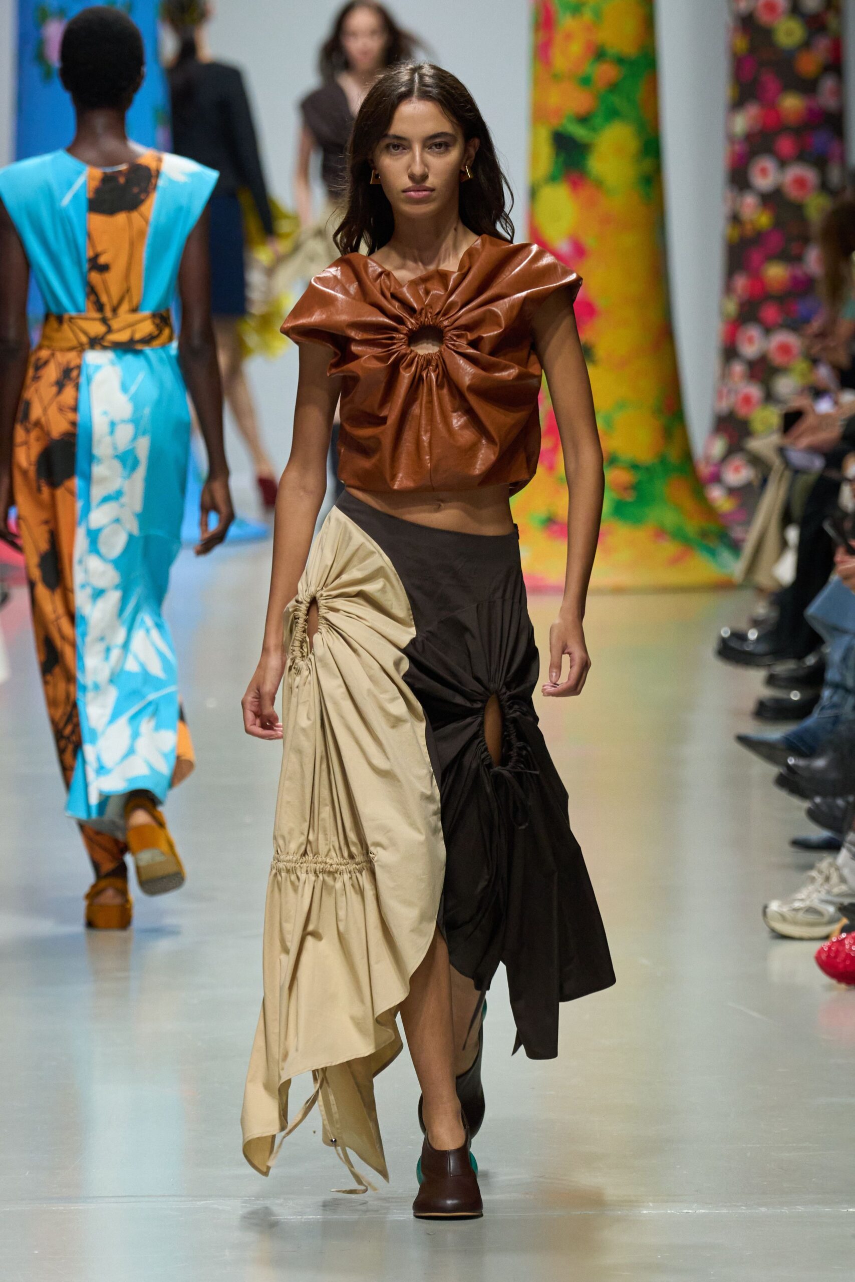 brown draped top with asymmetric skirt