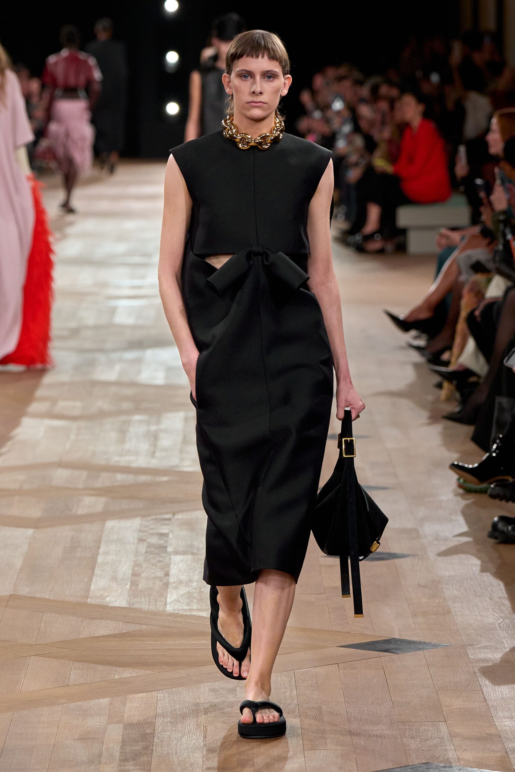 black fitted sleeveless midi dress
