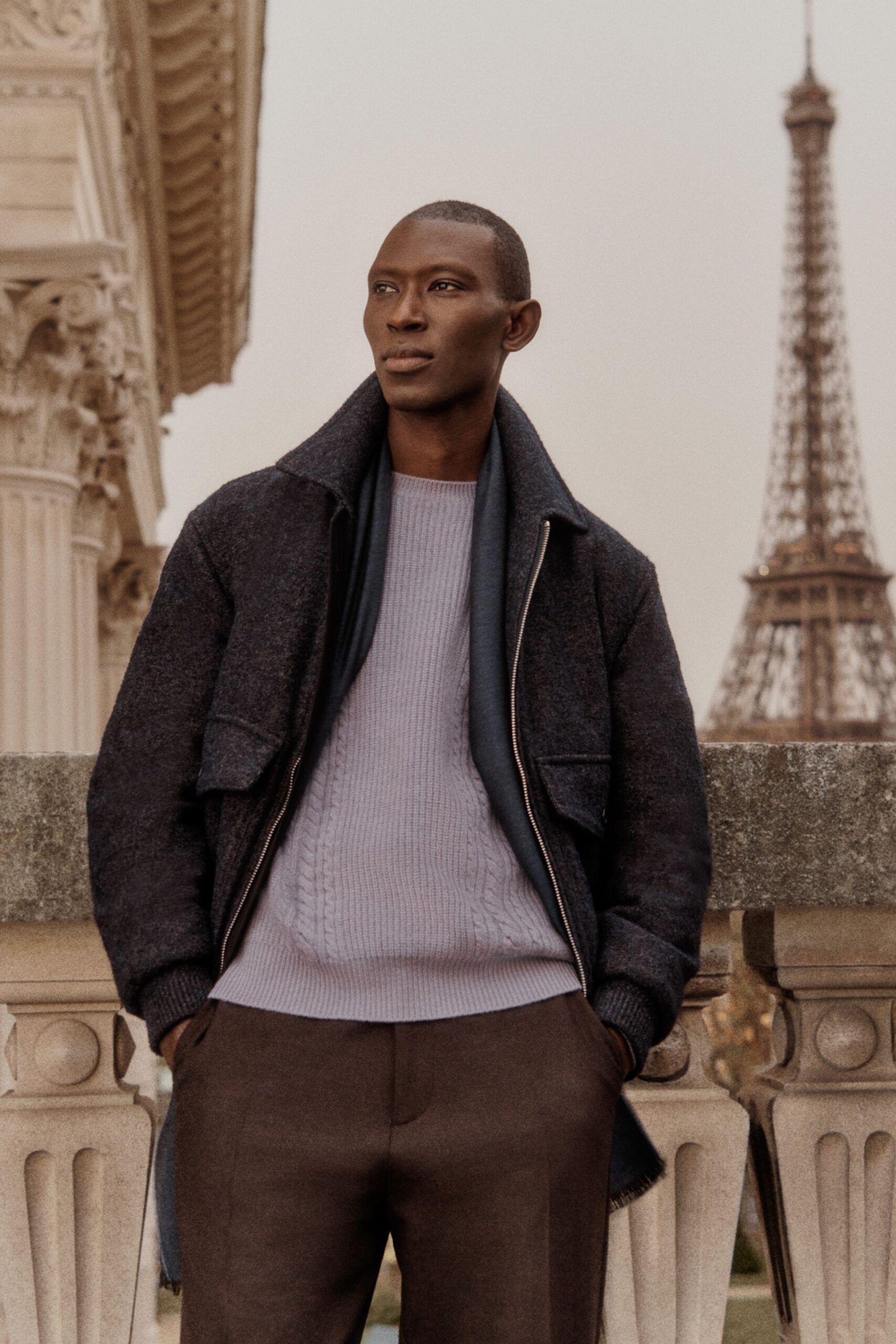 black wool long-sleeve collared structured zippered jacket
