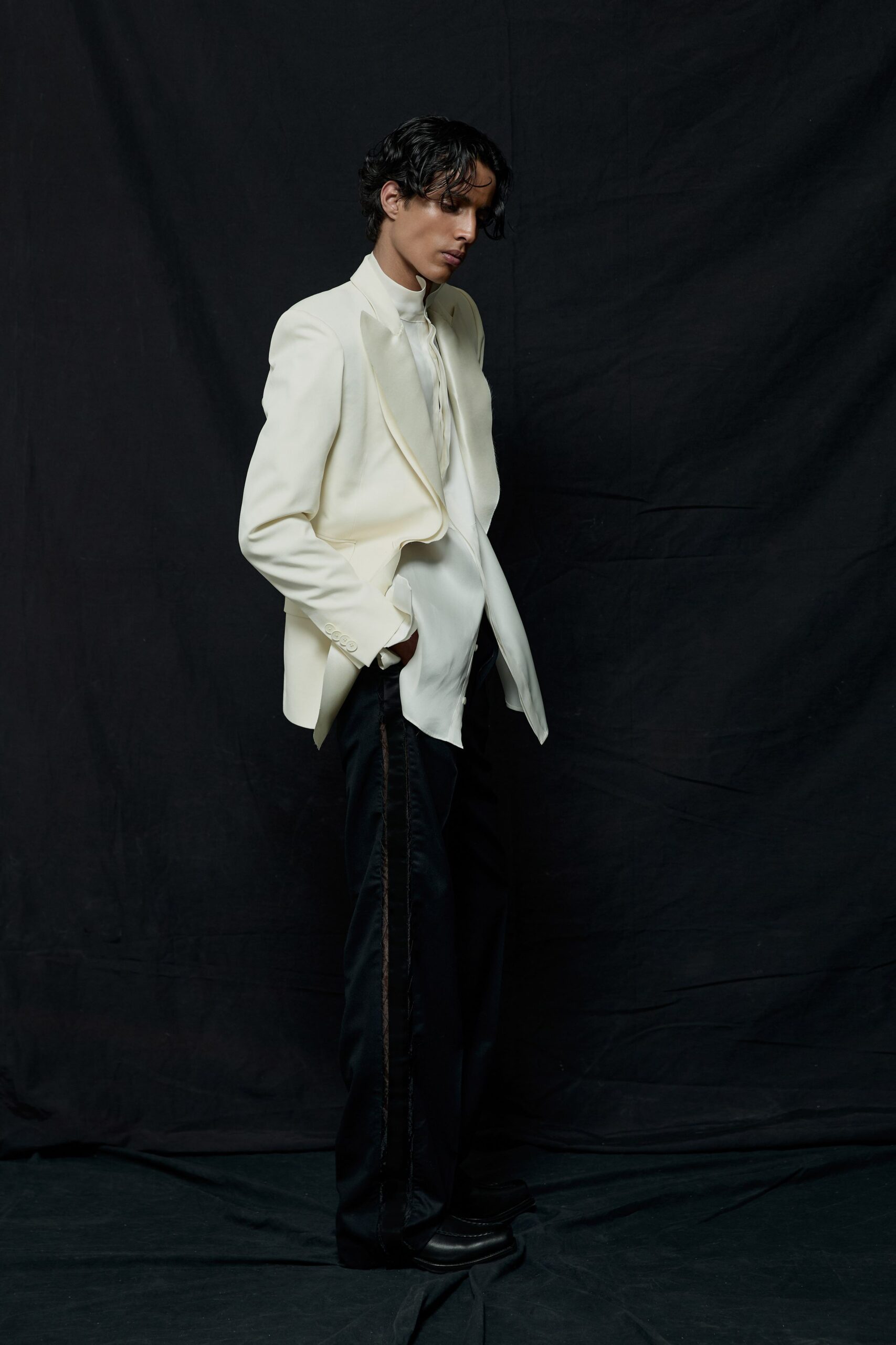 white tailored blazer with black pants