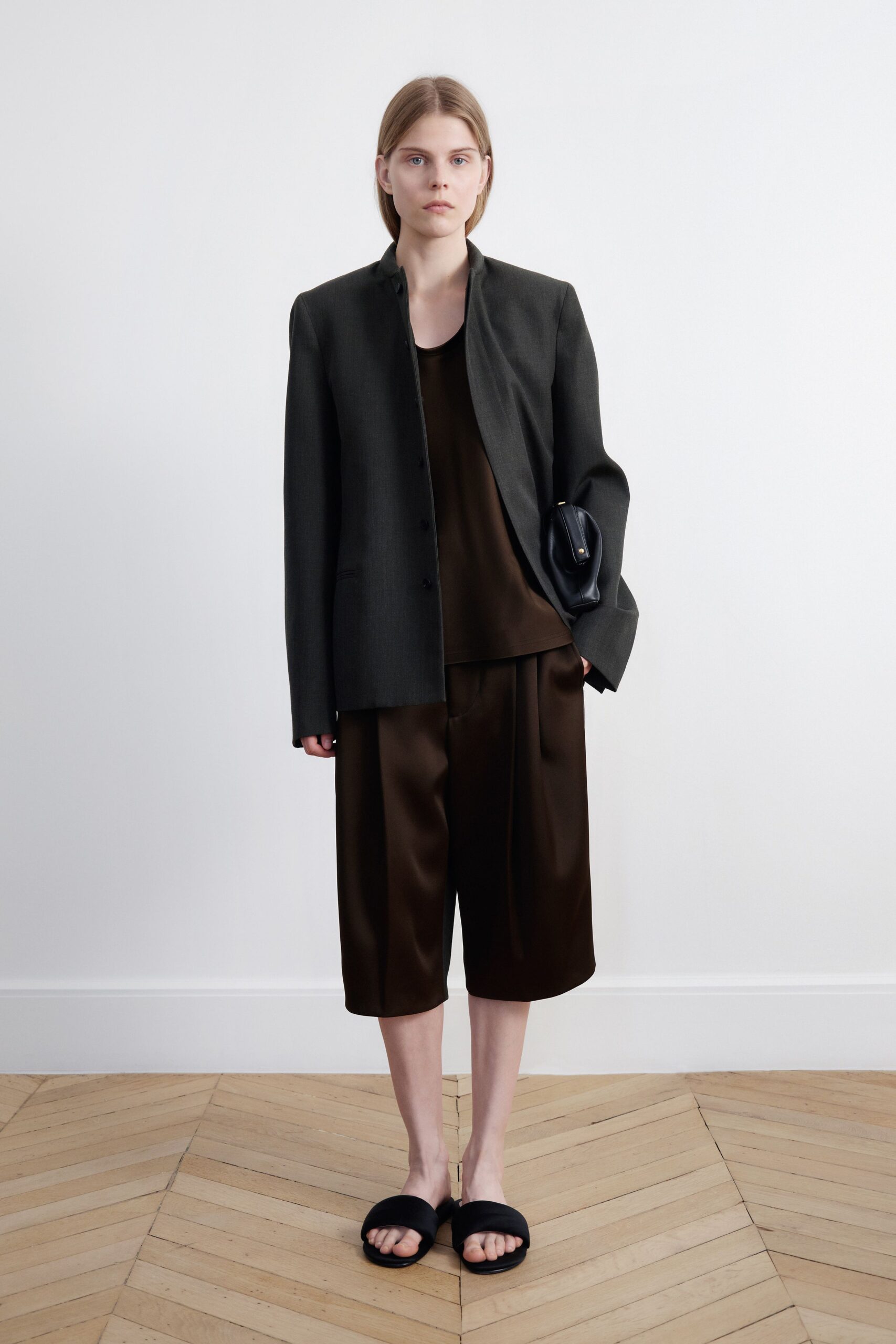 black structured jacket with brown top
