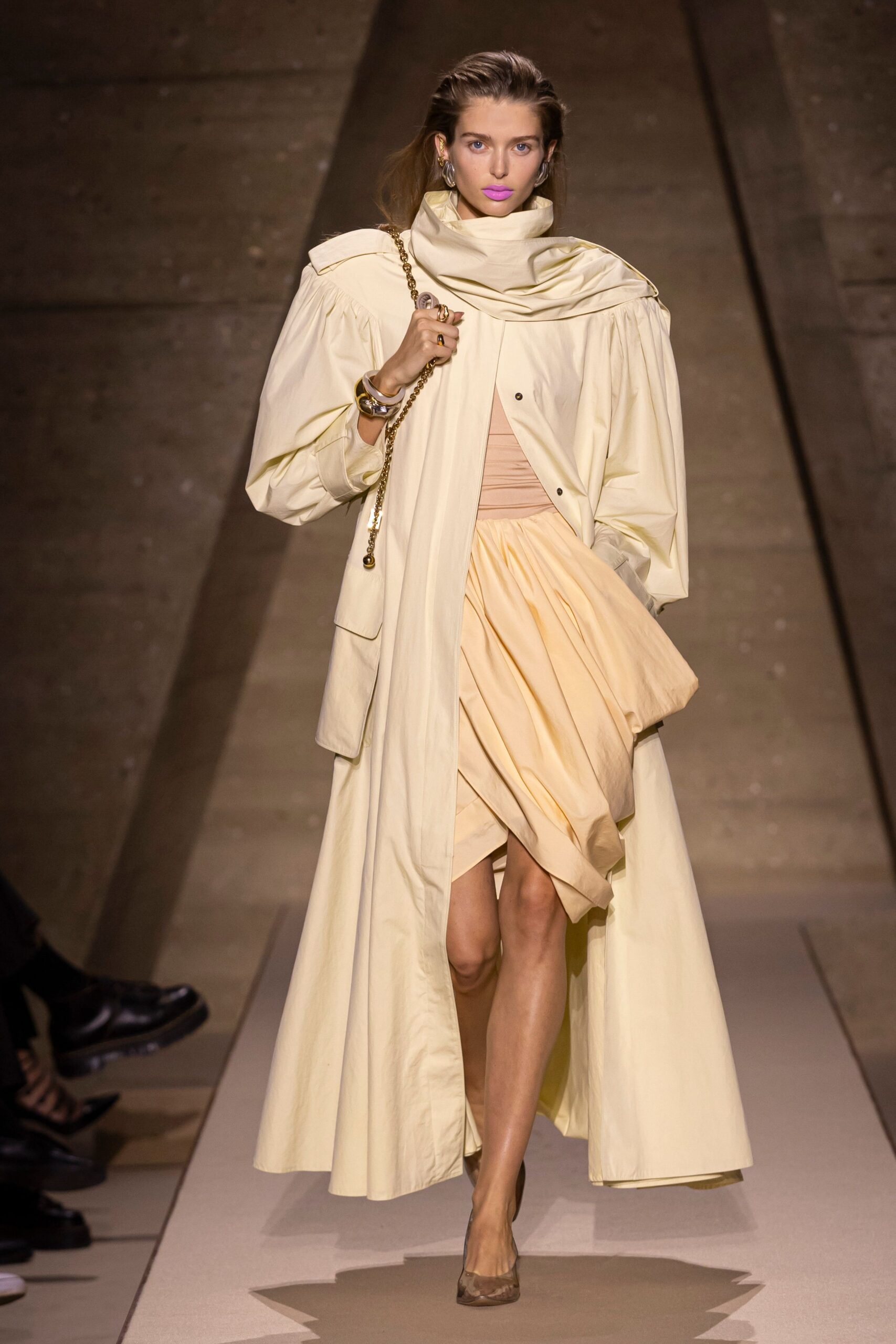 beige coat with pleated skirt
