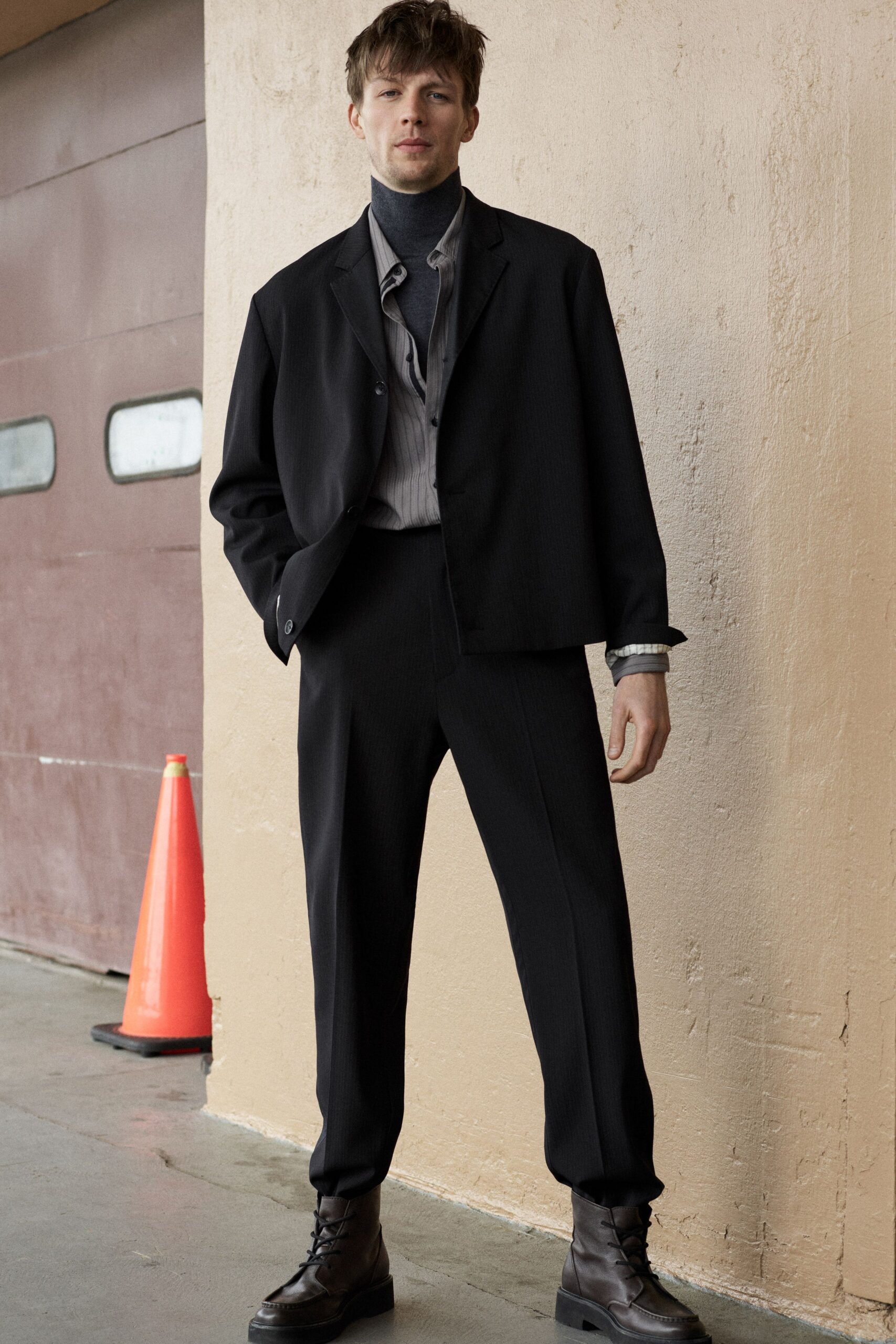 black blazer gray shirt tailored pants