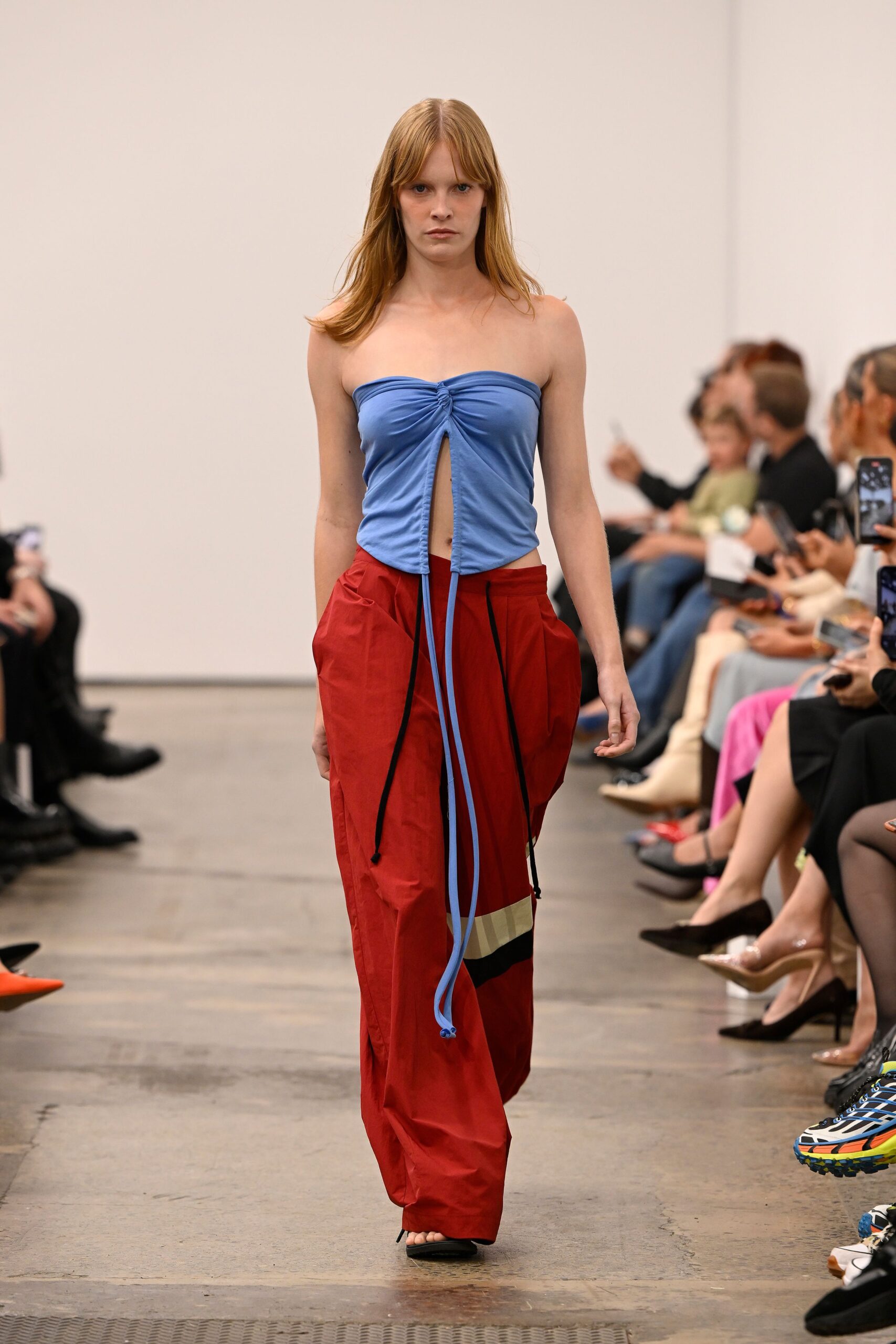 blue fitted top red cargo pants