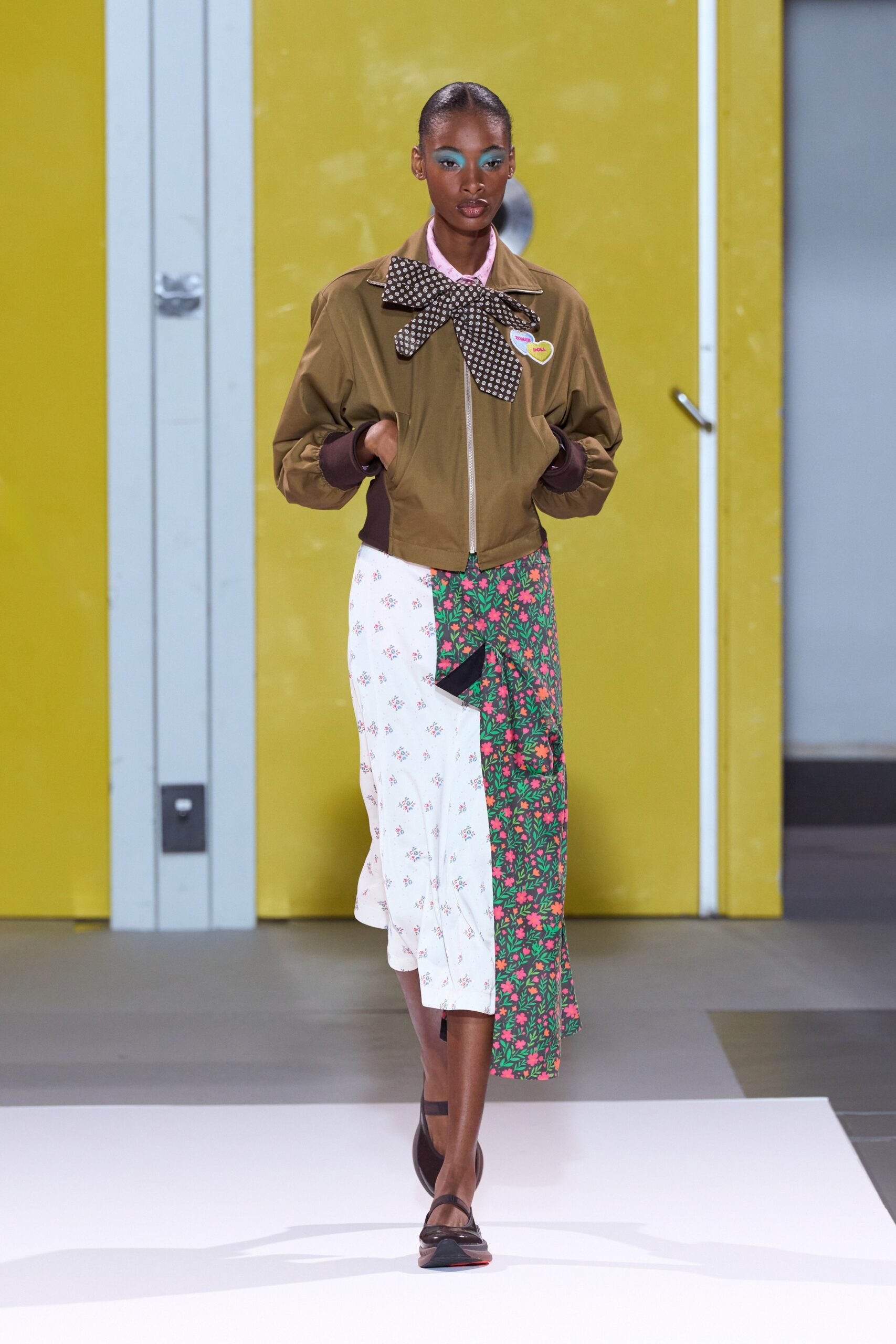 brown fitted jacket with floral skirt