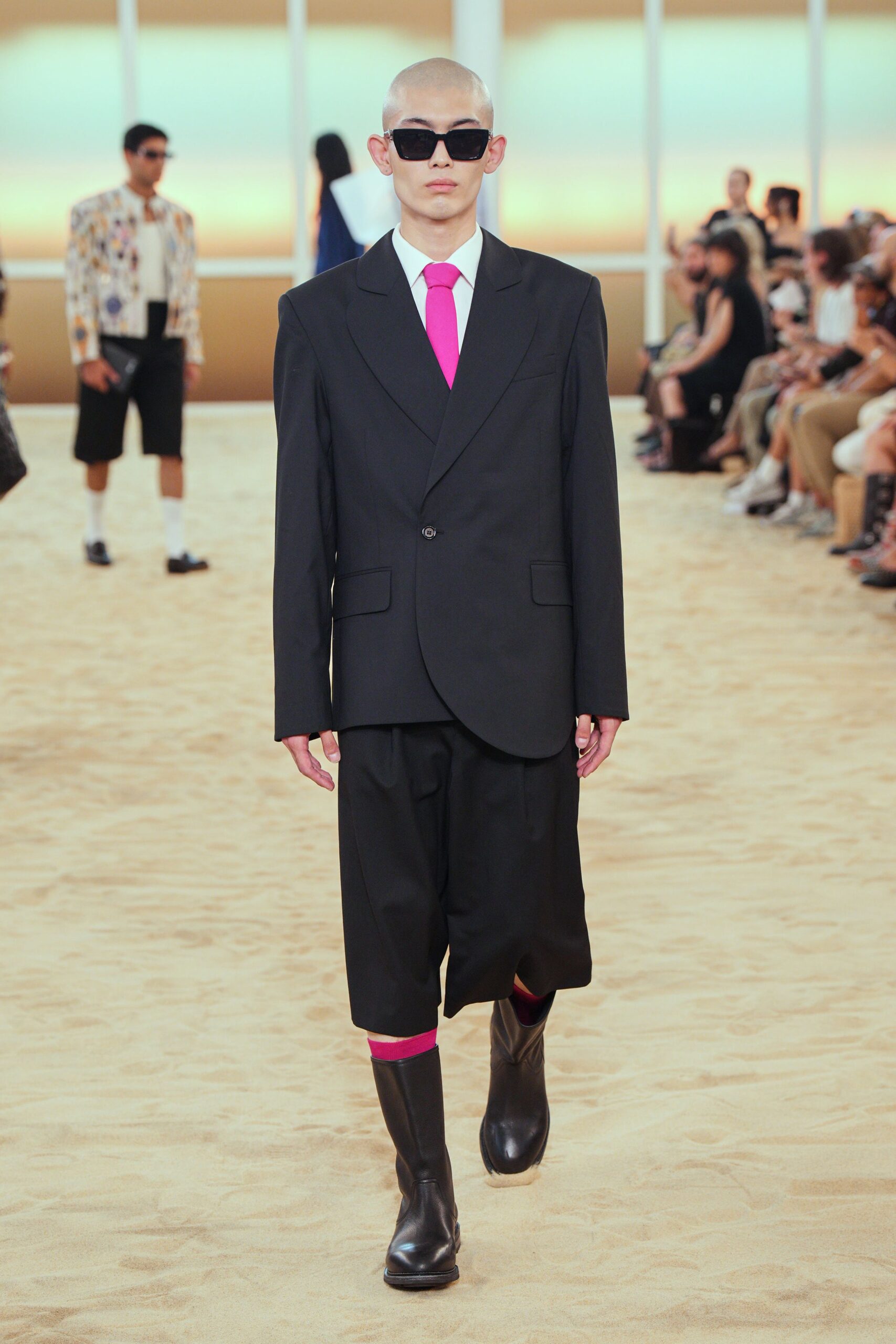 black blazer with pink tie