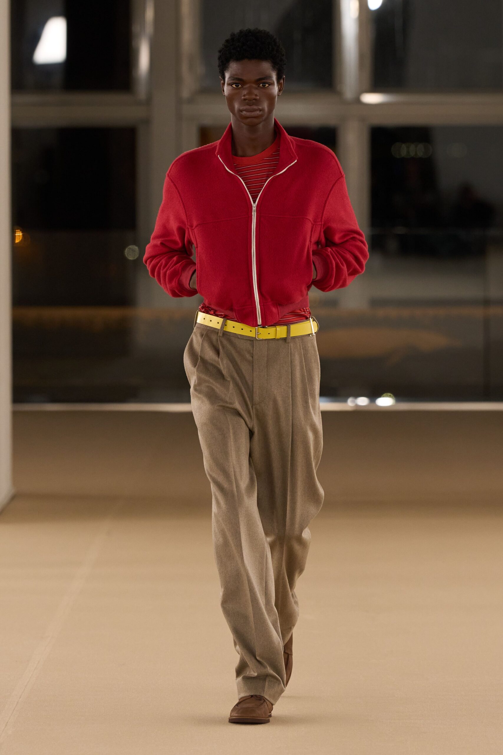 red jacket with beige pants