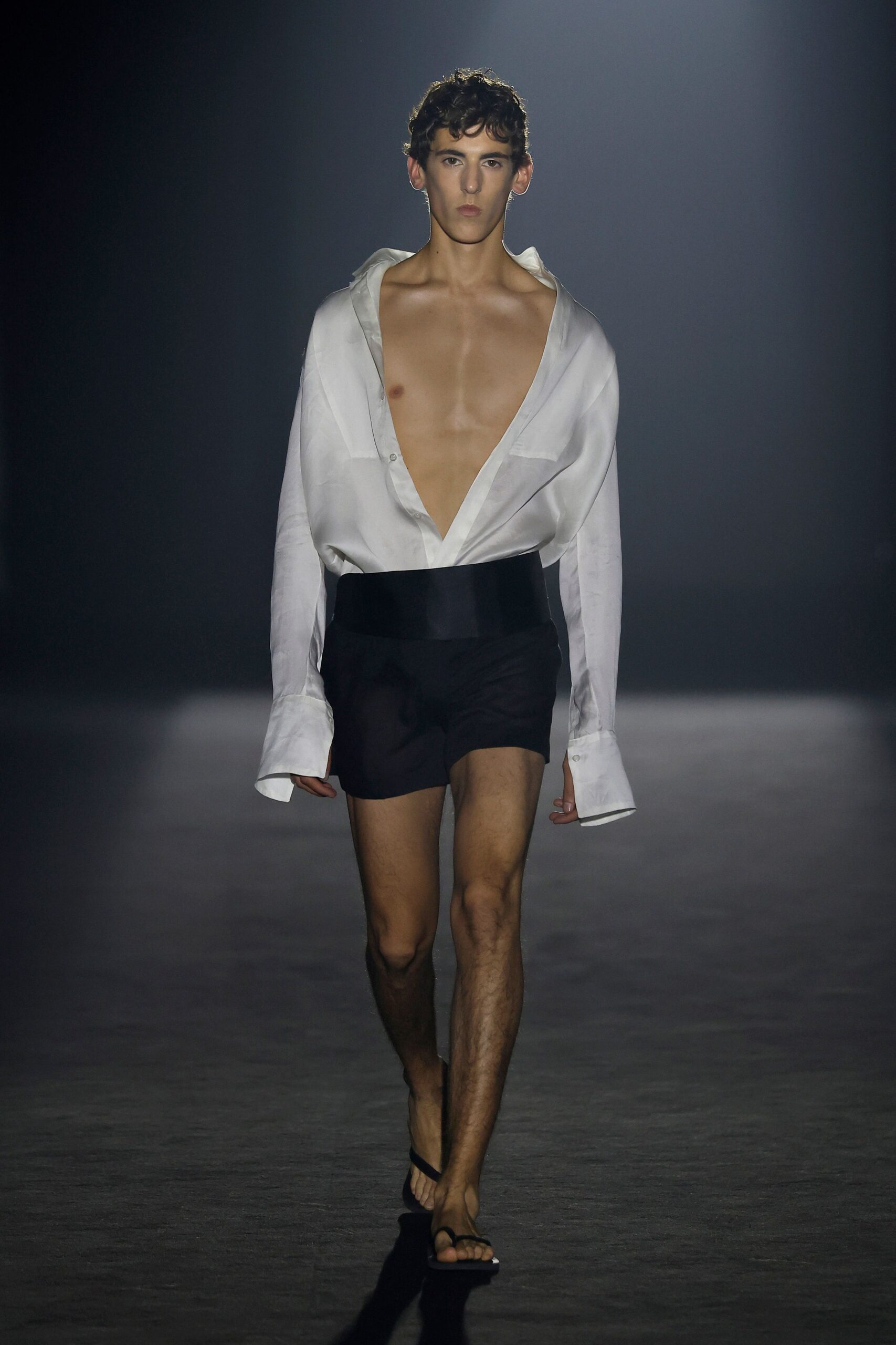 white relaxed shirt black shorts