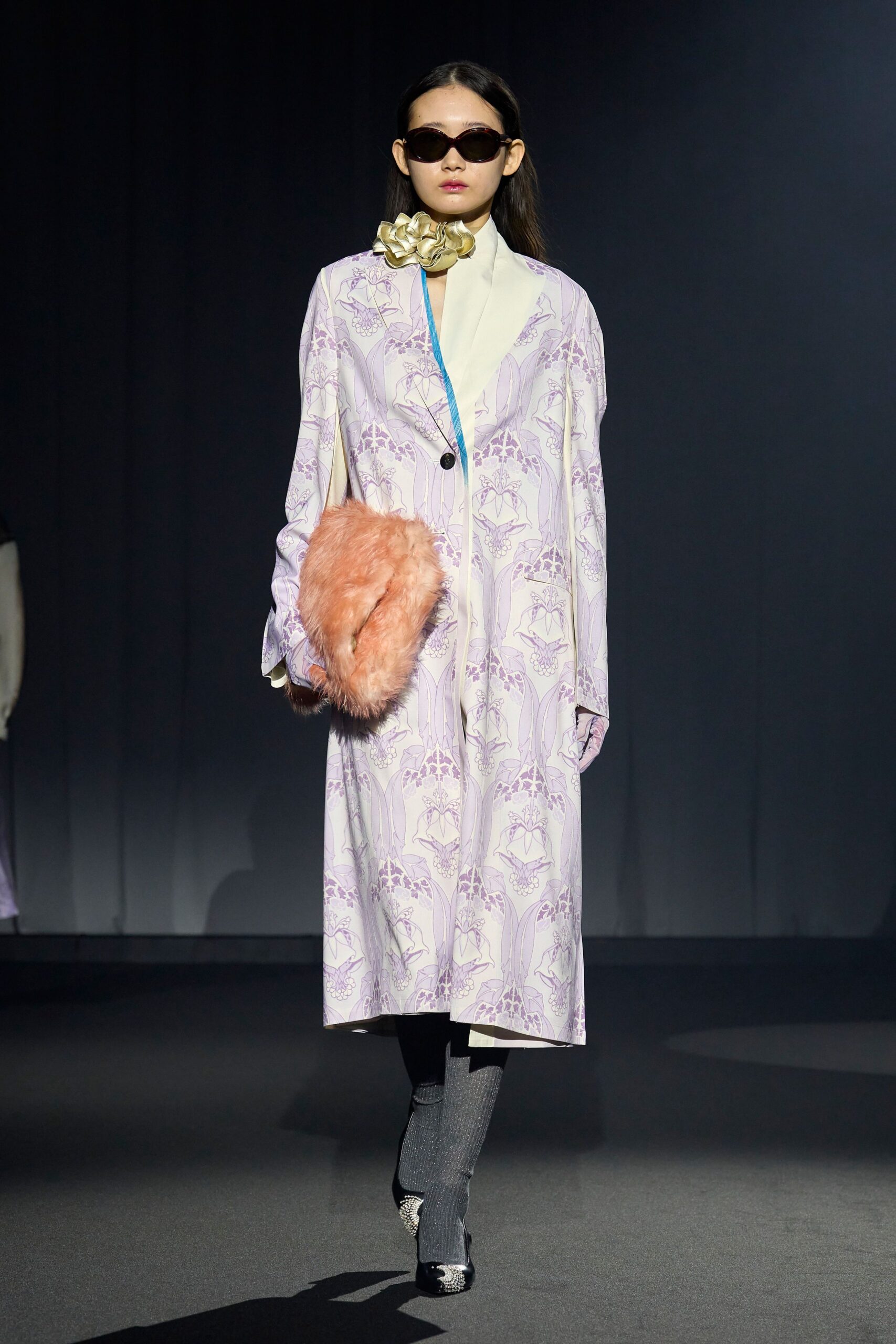 purple printed midi coat with pink fur bag