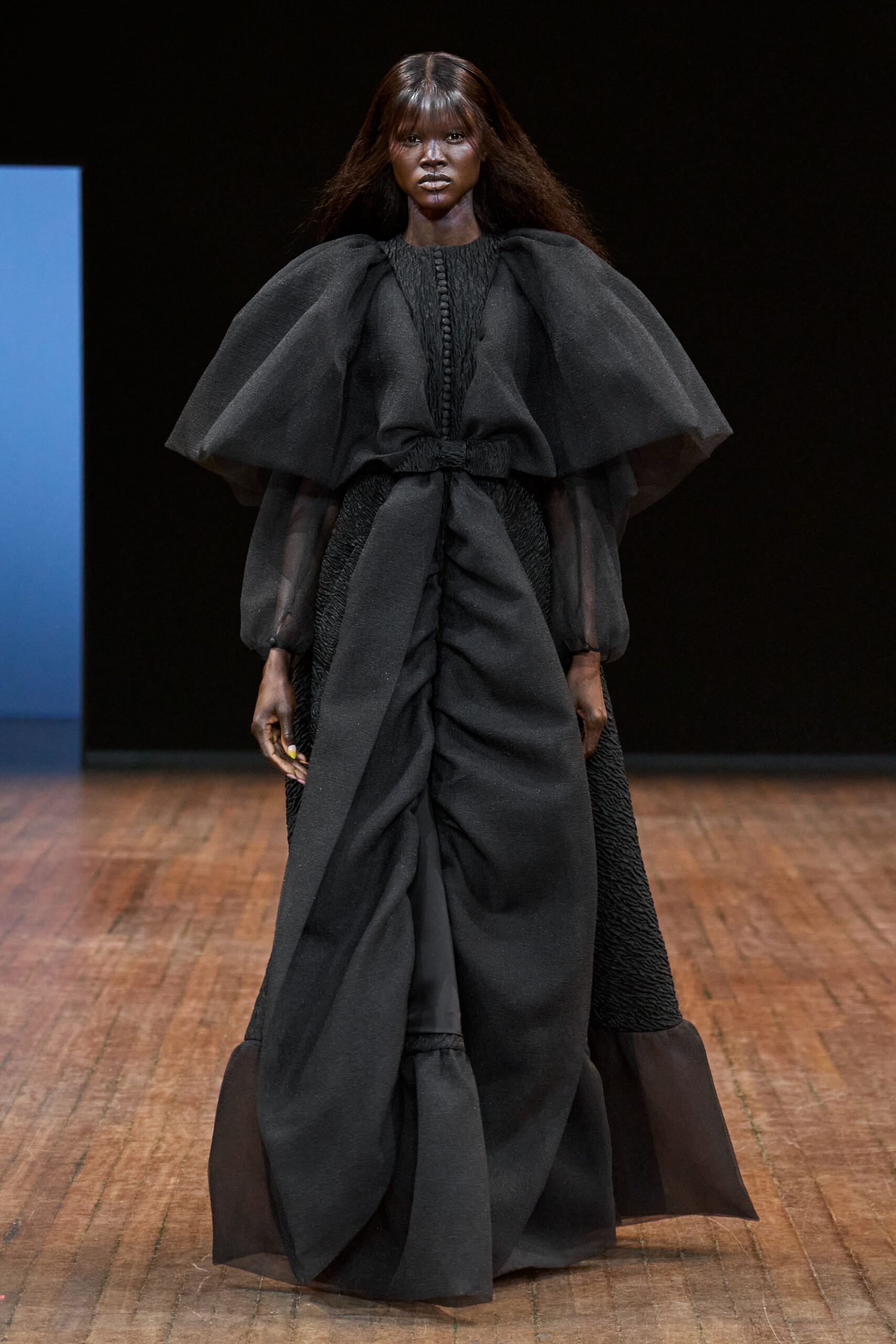 black ruffled long-sleeve gown