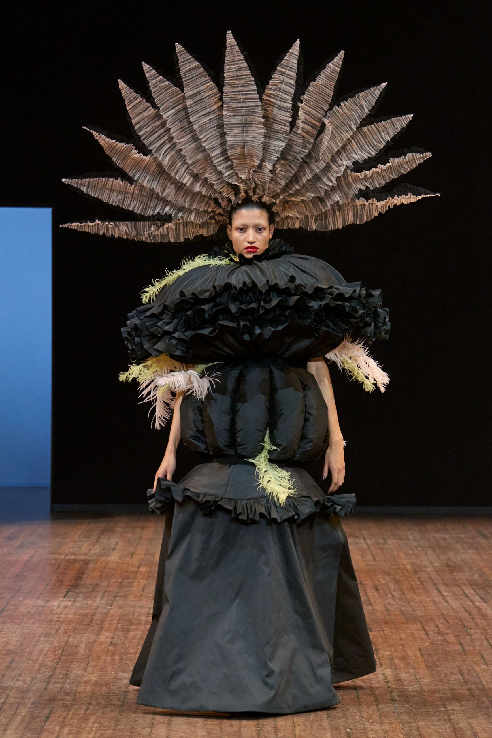 black ruffled gown with headpiece