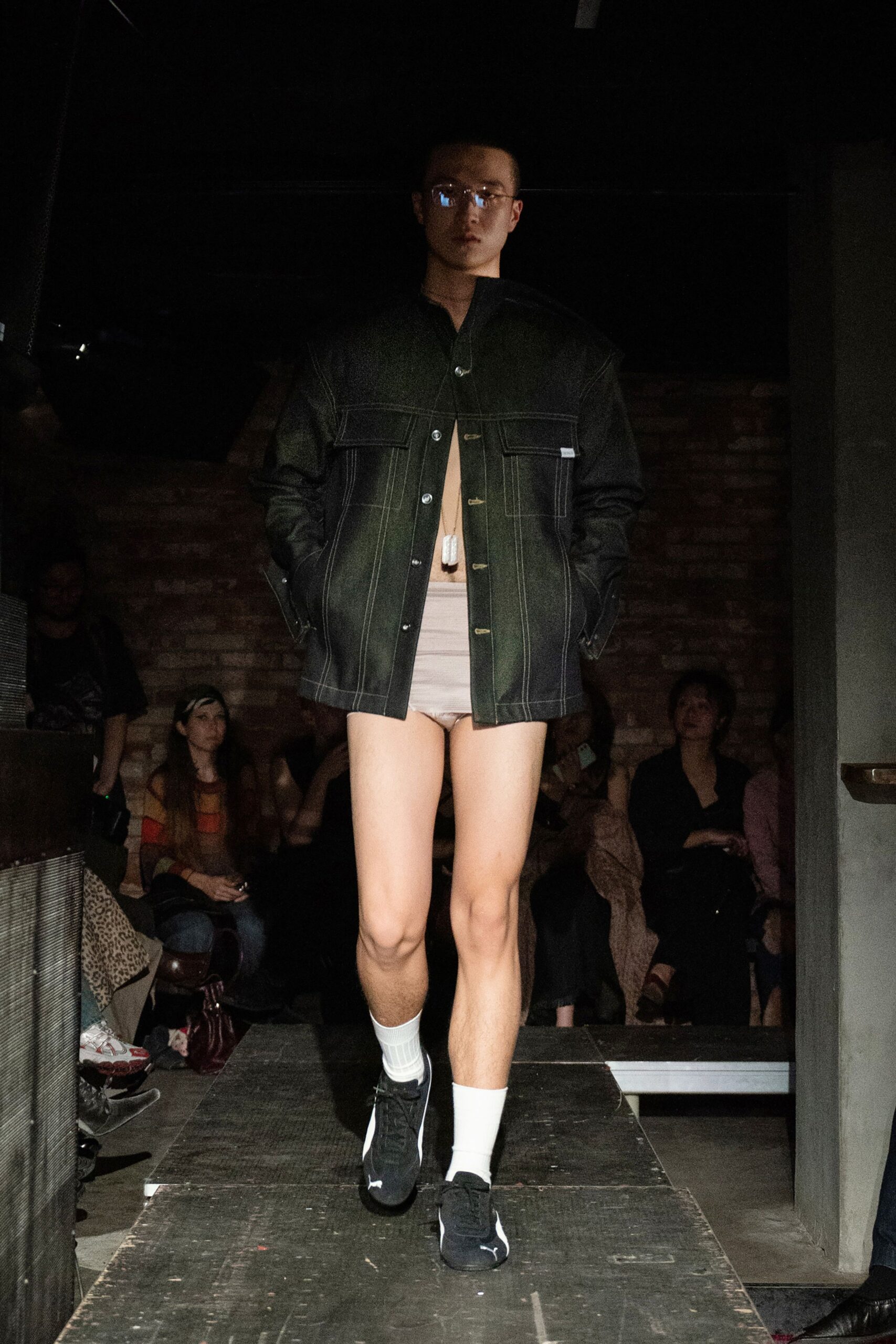 black denim jacket with beige shorts