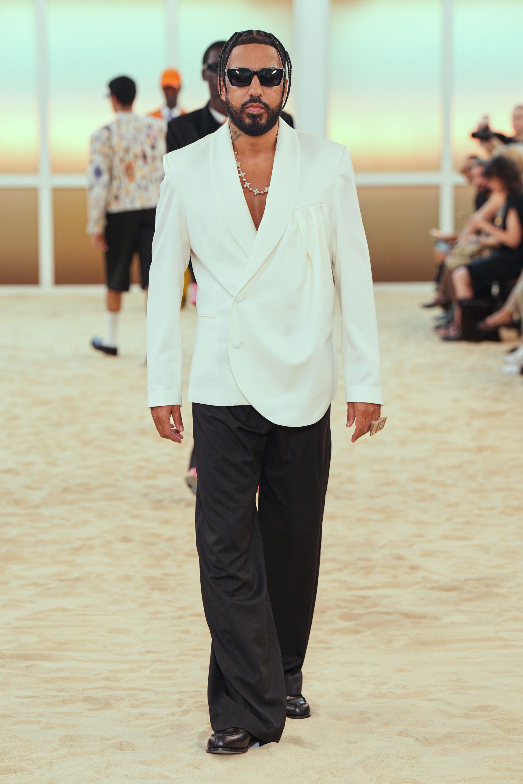 white blazer black pants