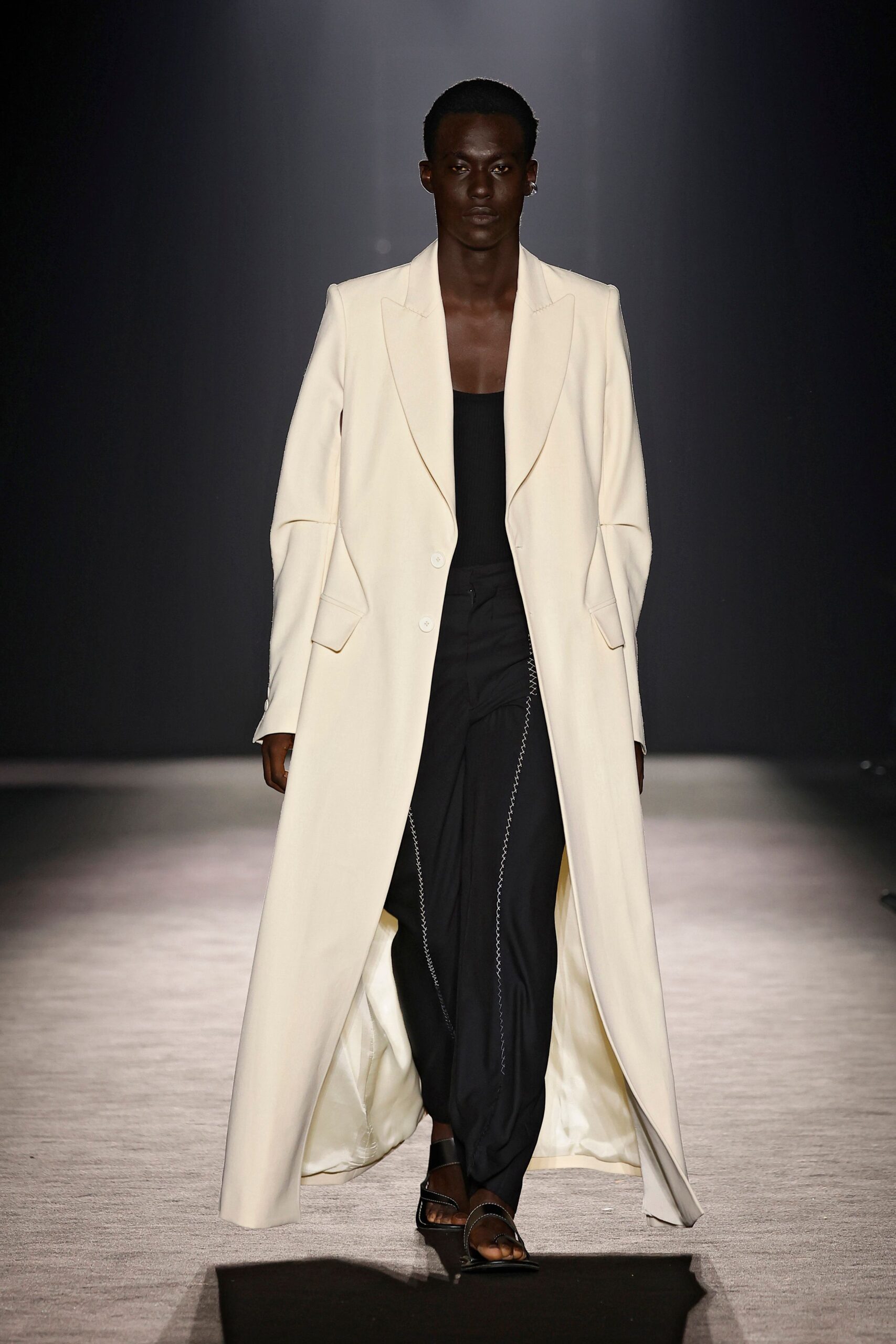 white wool long-sleeve collared structured buttoned maxi coat