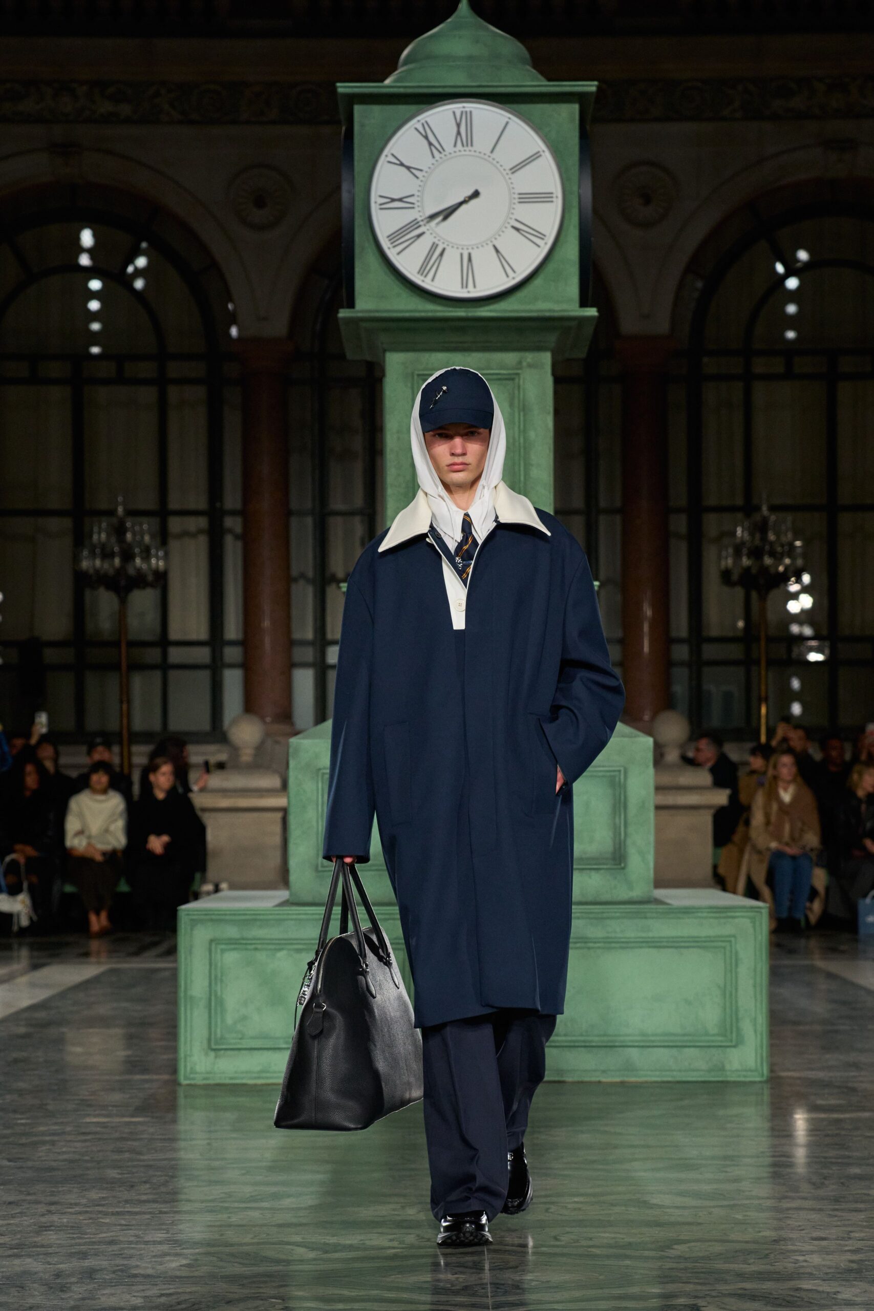 blue wool coat with black bag