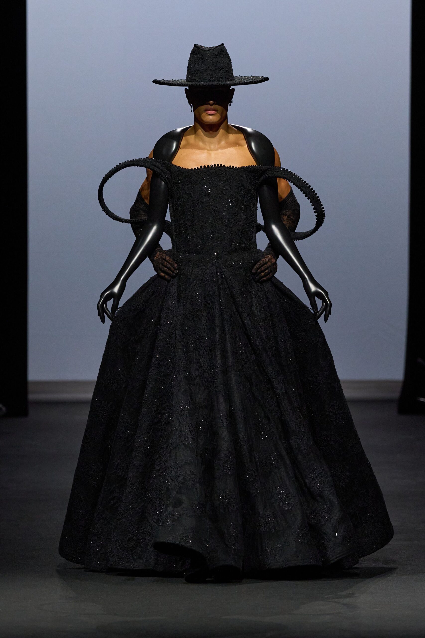 black silk sleeveless off-shoulder fitted embellished a-line gown