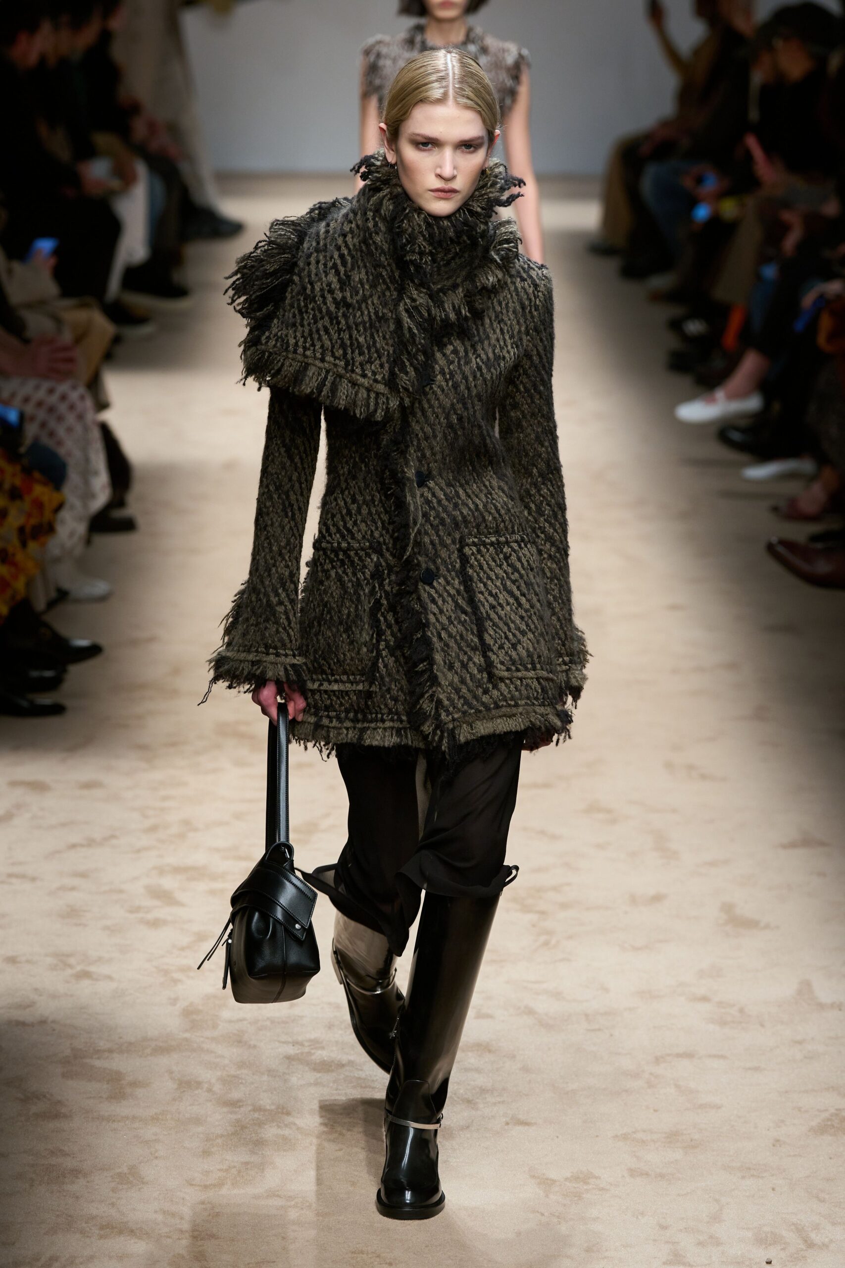 black wool coat with fringes