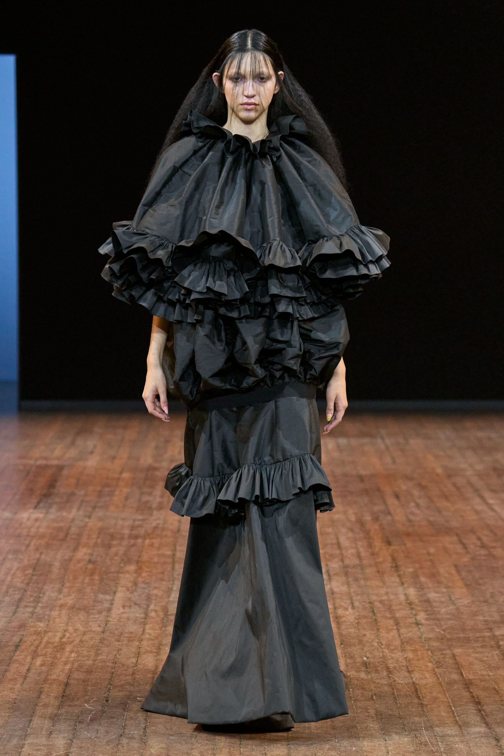 black ruffled silk gown