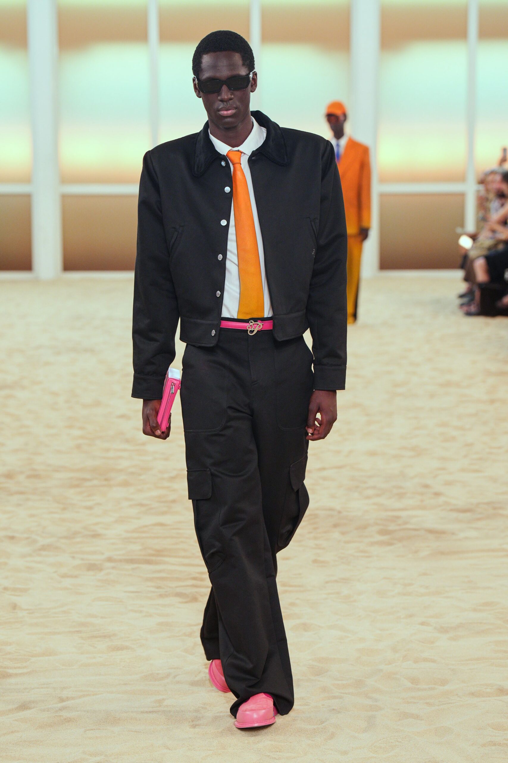 black jacket white shirt relaxed pants