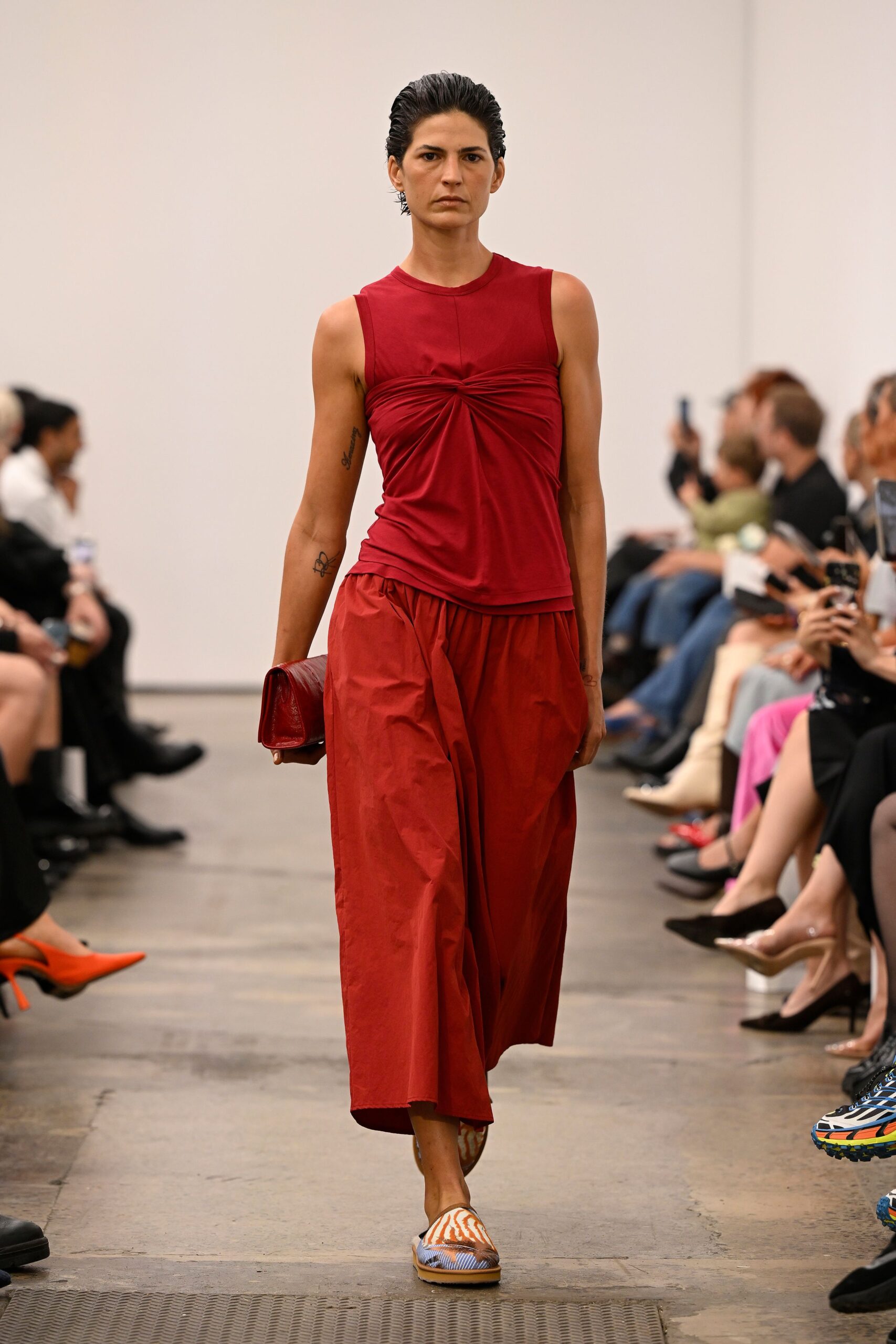 red fitted top with wide-leg pants