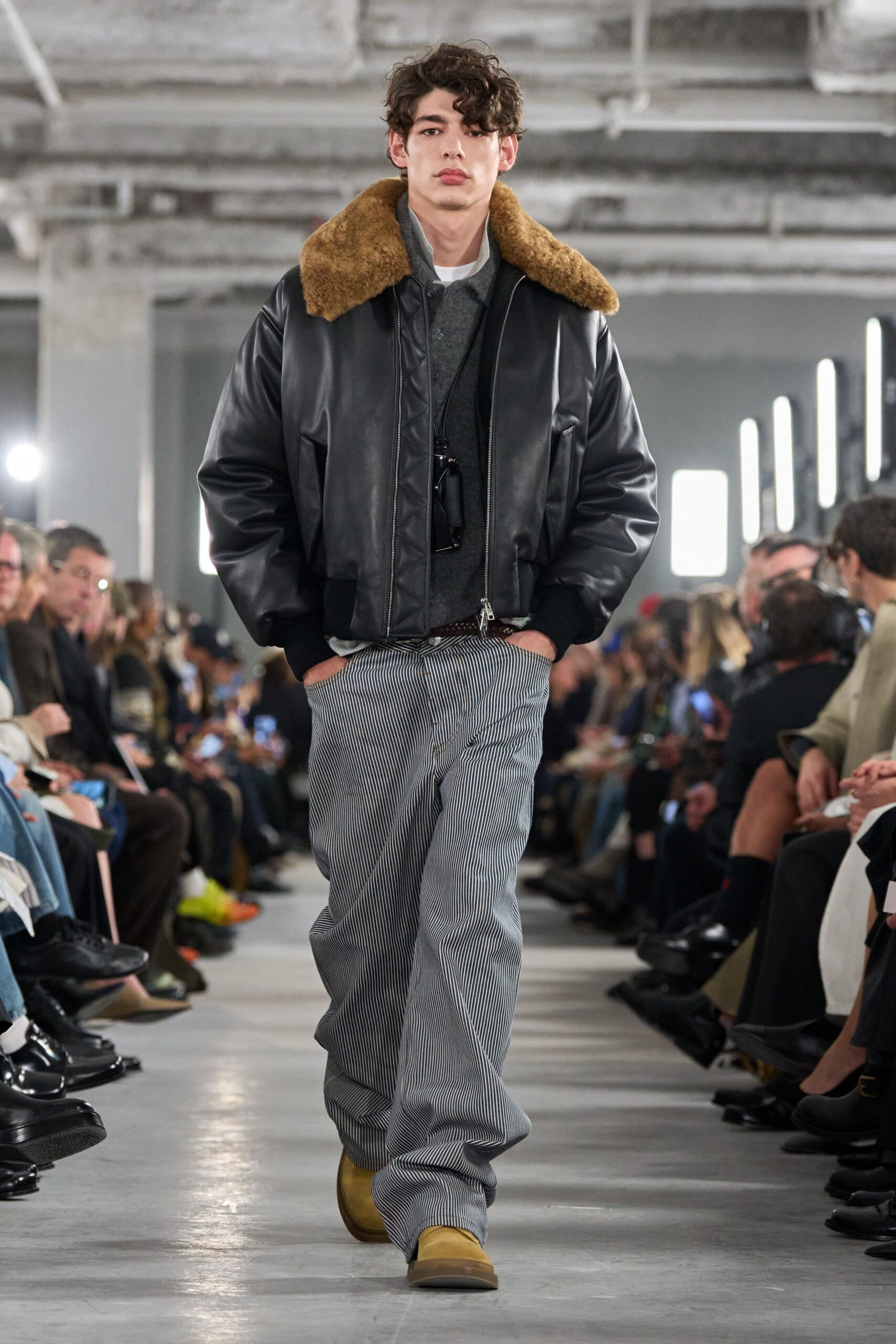 black leather jacket gray pants brown shoes