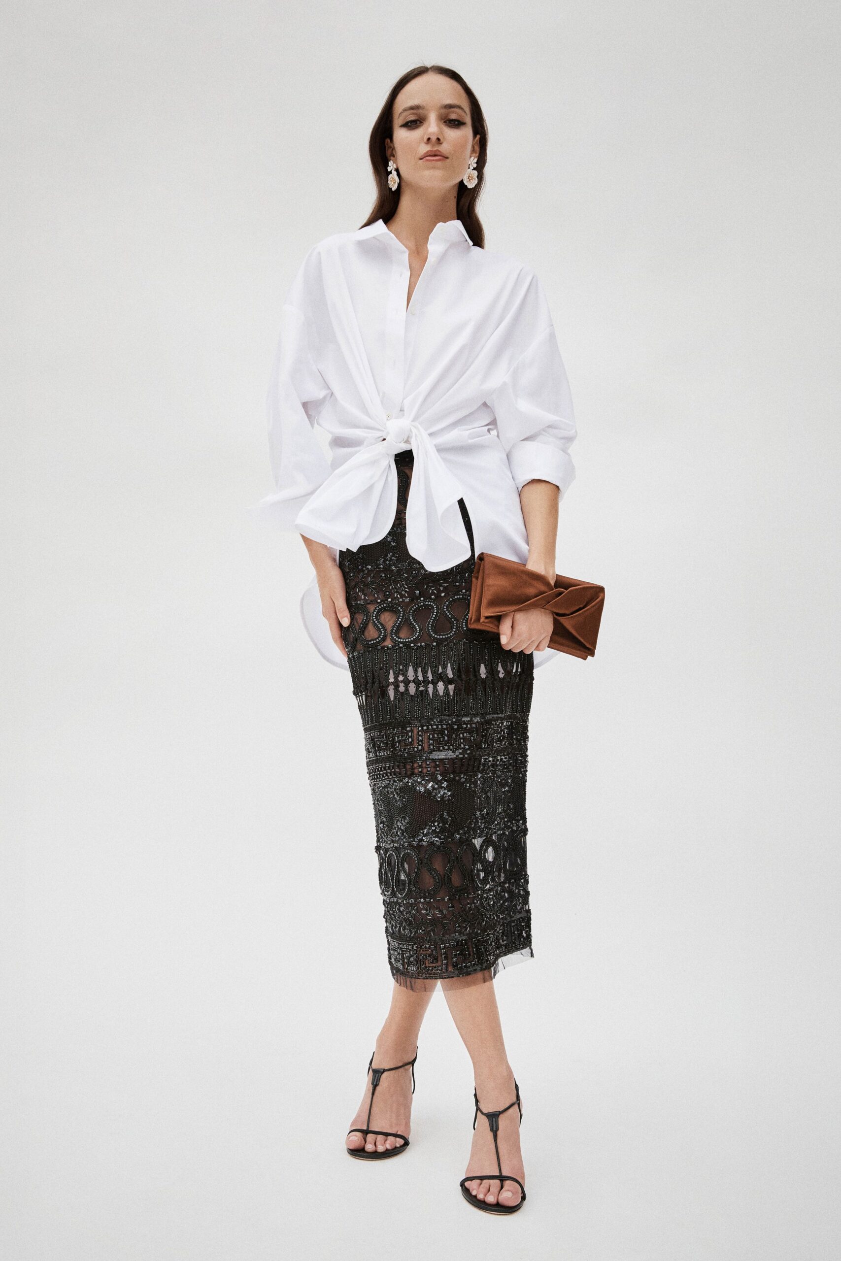 white relaxed shirt with black lace skirt
