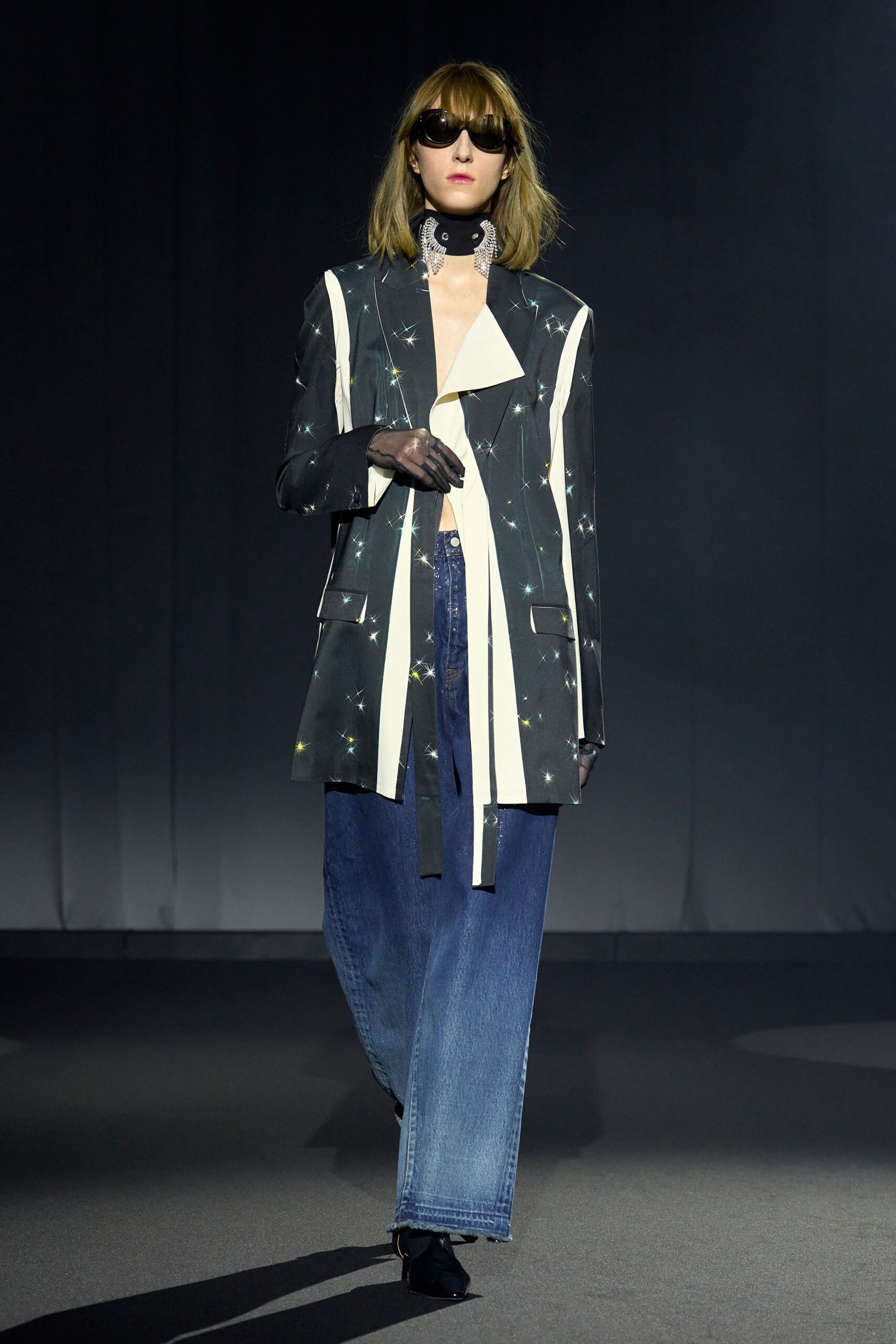 black and white jacket with denim pants