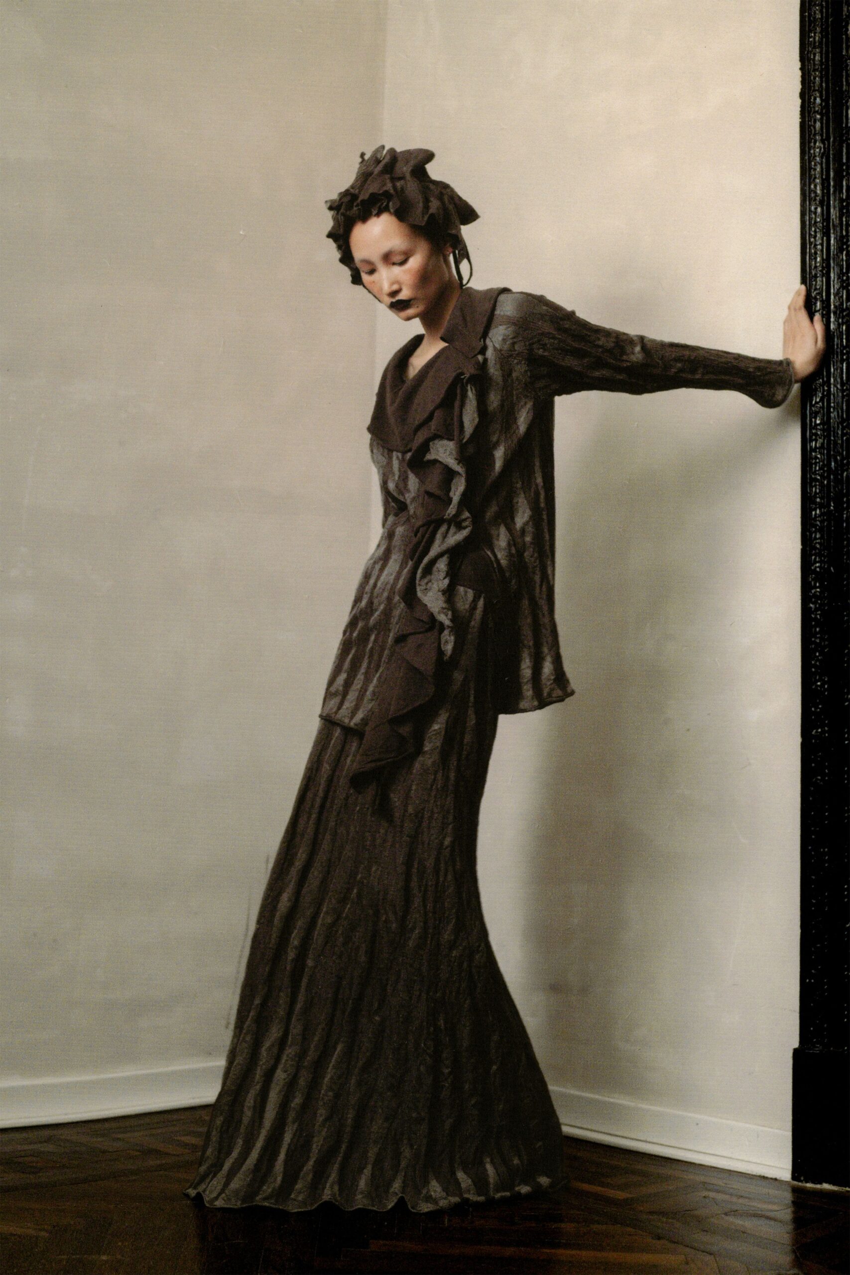 brown silk long-sleeve v-neck fitted ruffled draped gown
