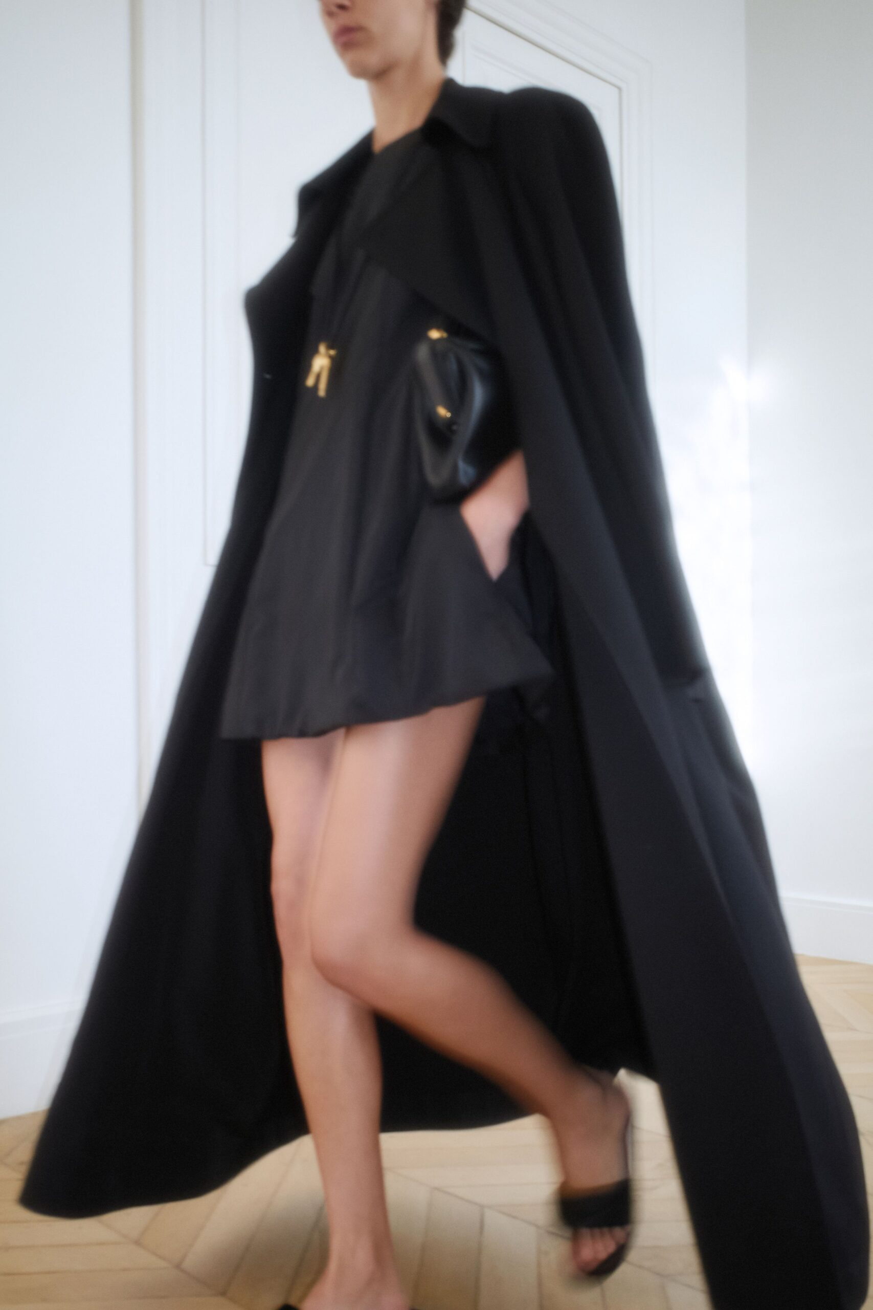 black cape and mini dress