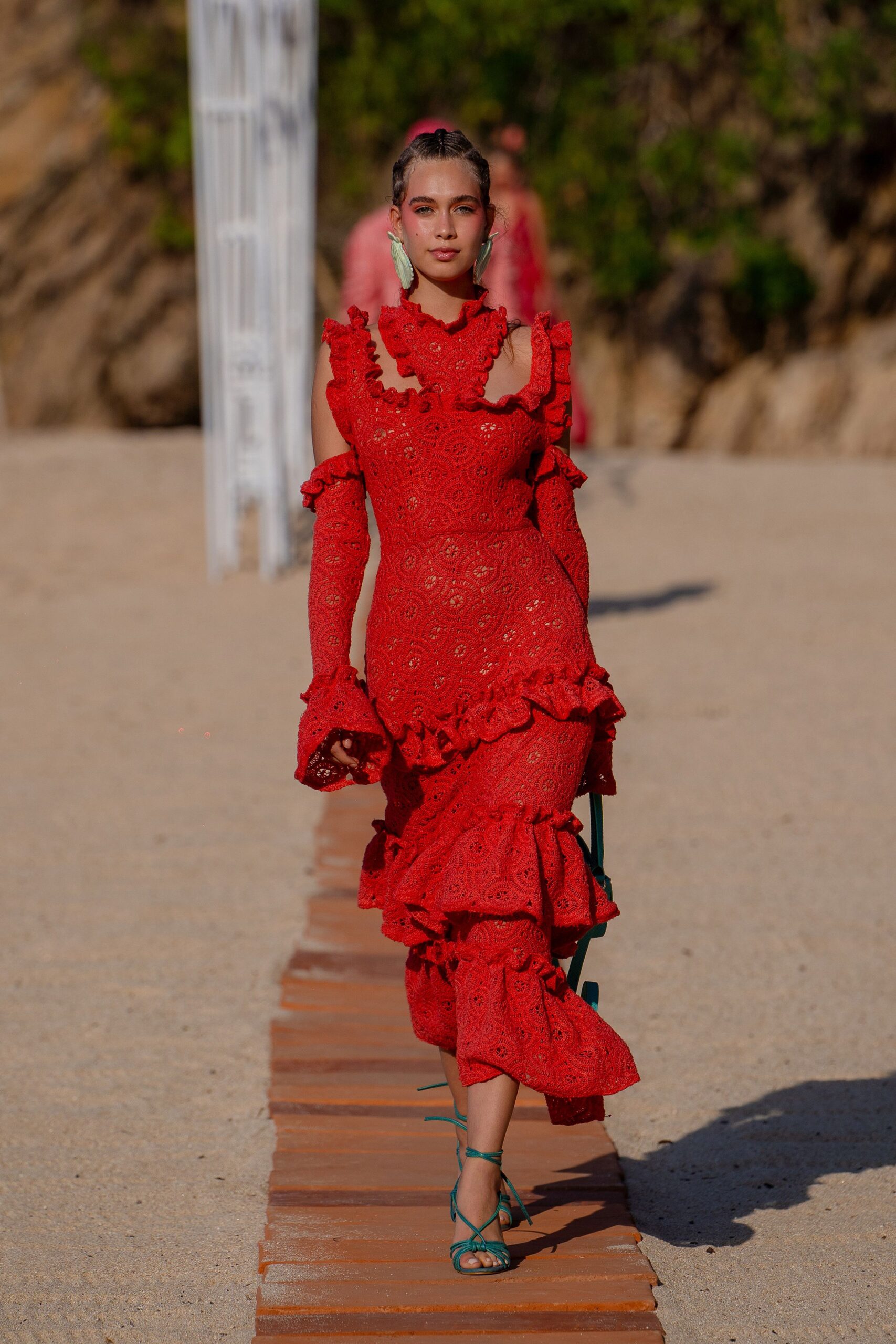 red lace long-sleeve v-neck fitted ruffled tiered gown