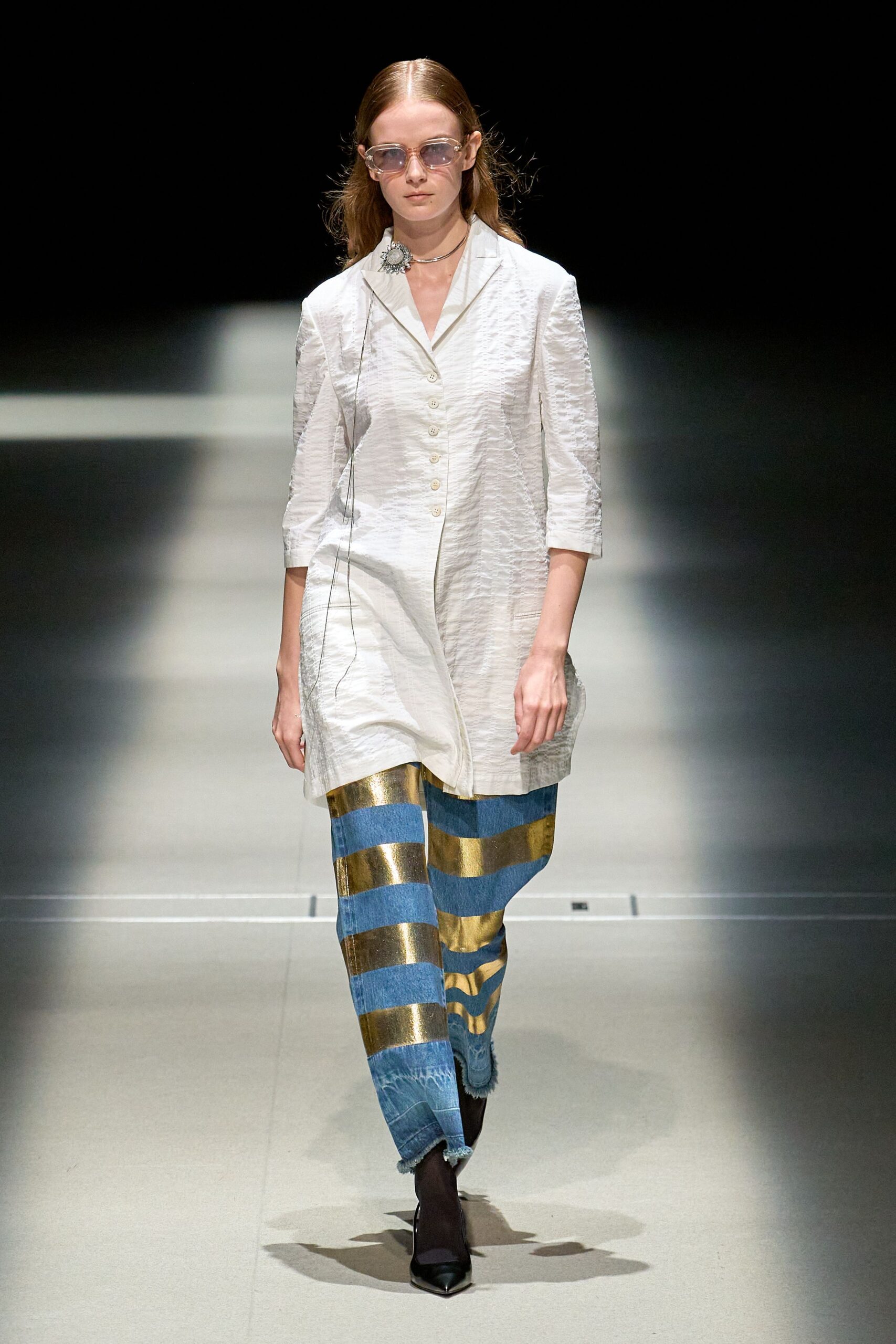 white relaxed shirt with striped pants