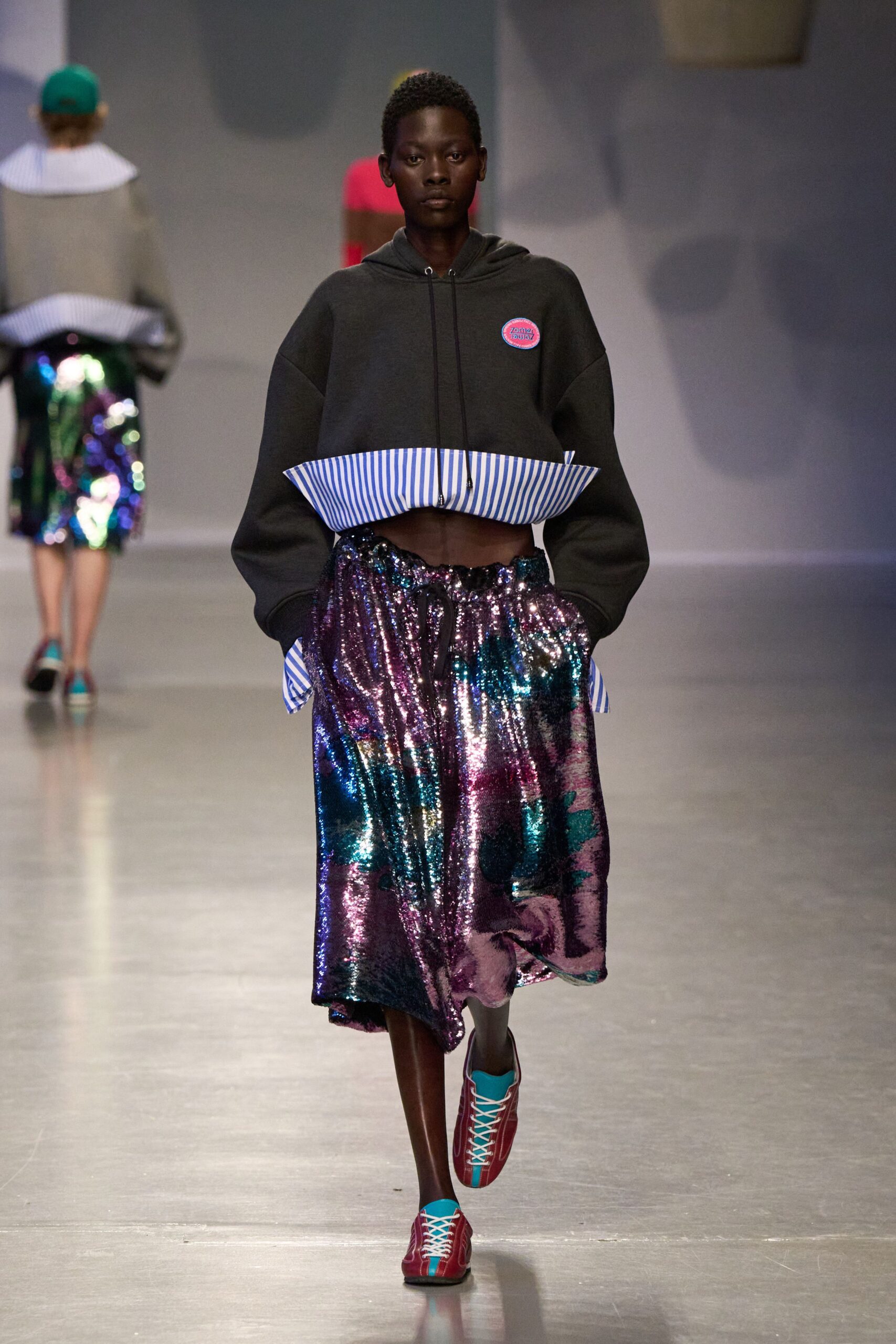 gray cropped hoodie with sequined skirt