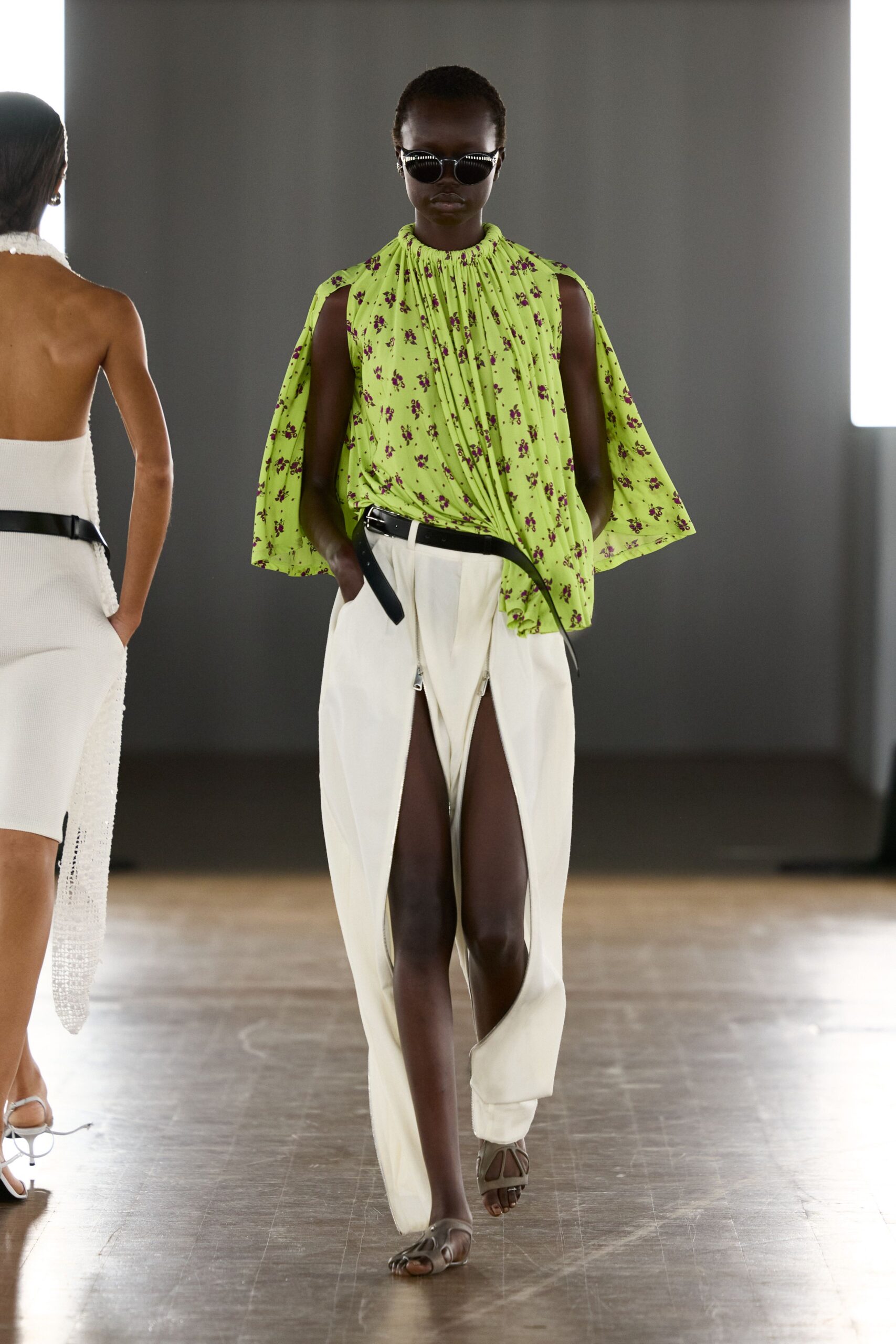 green silk sleeveless high-neck relaxed pleated printed top