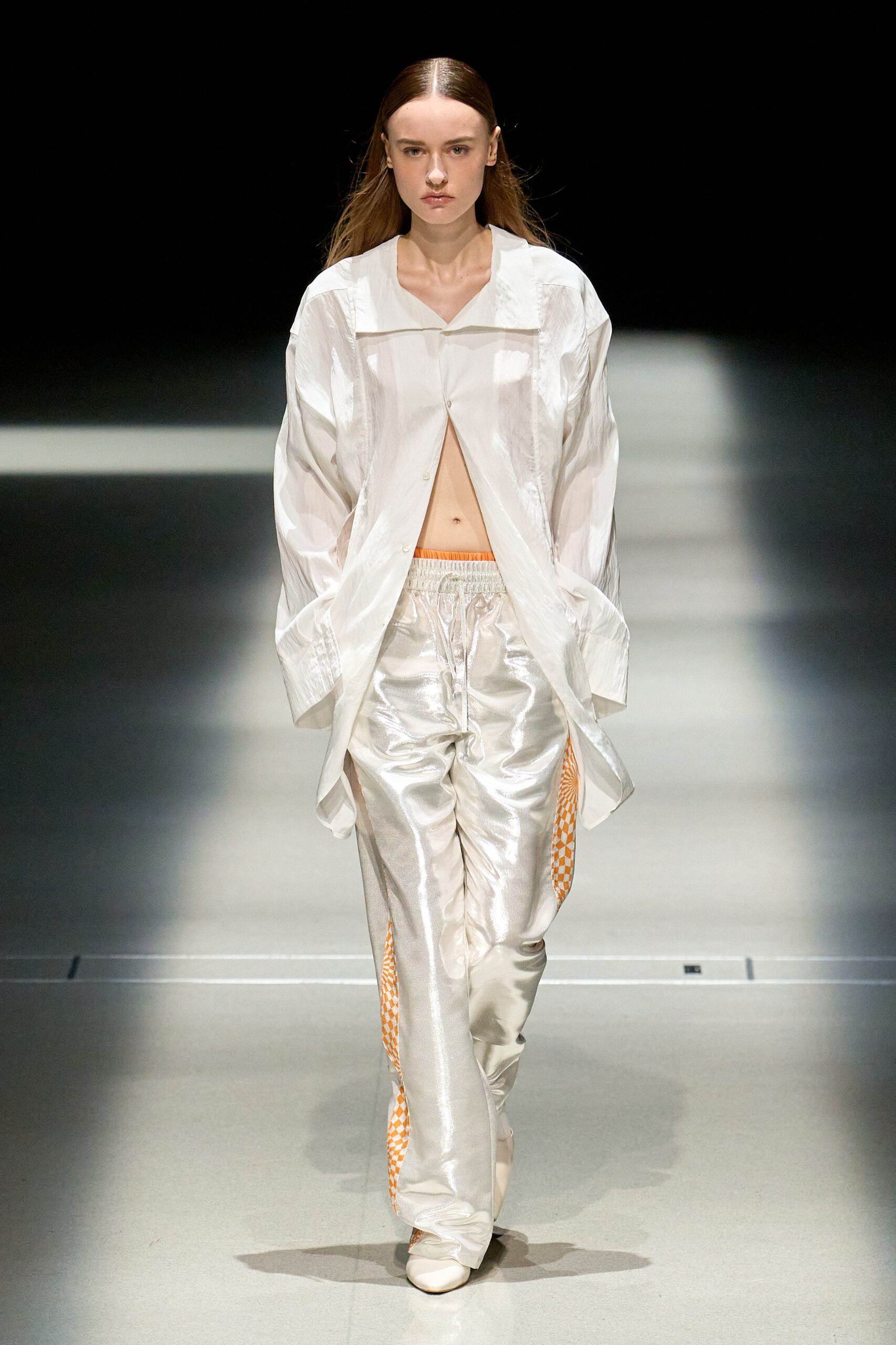 white oversized silk shirt and pants
