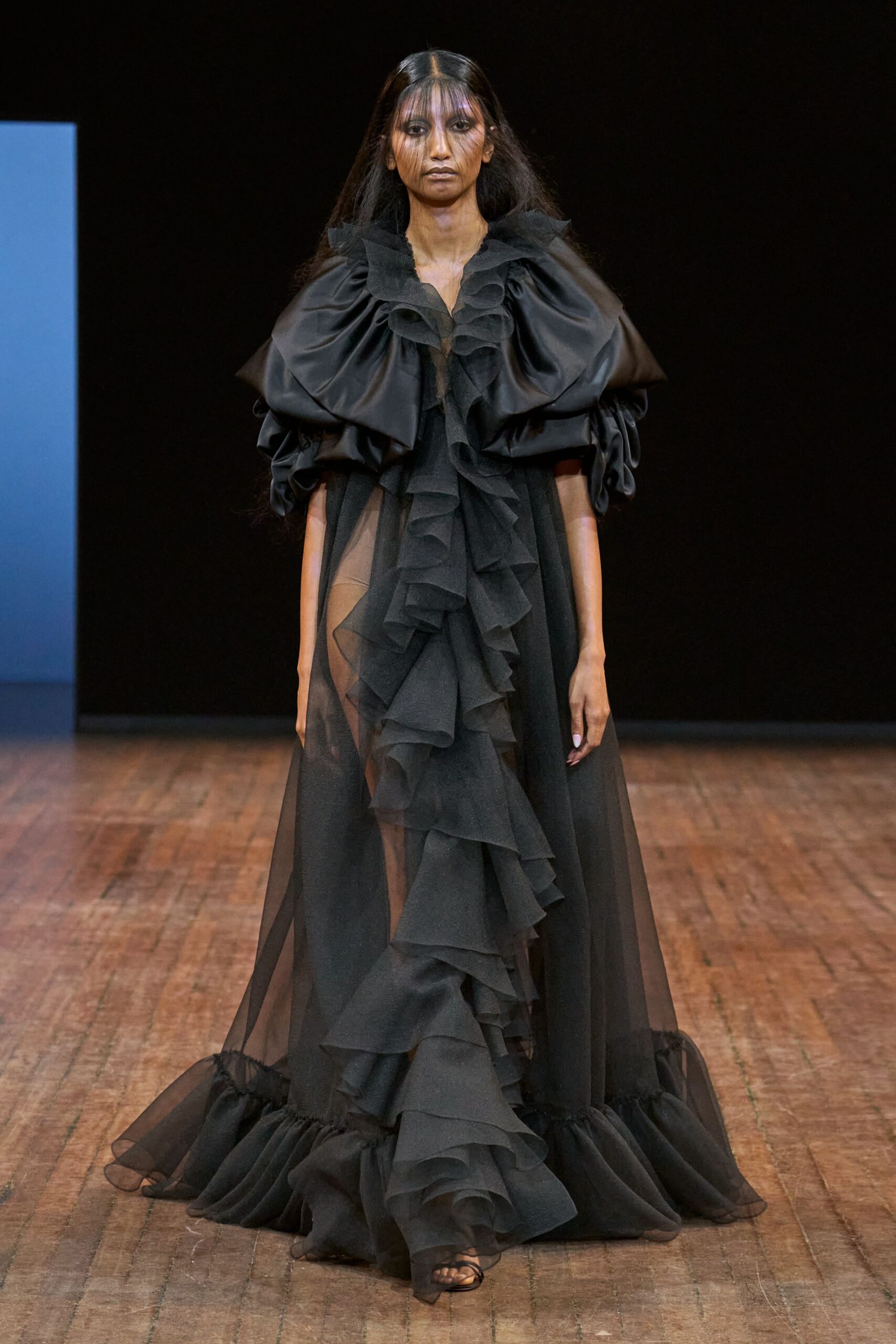 black tulle sleeveless v-neck fitted ruffled layered gown