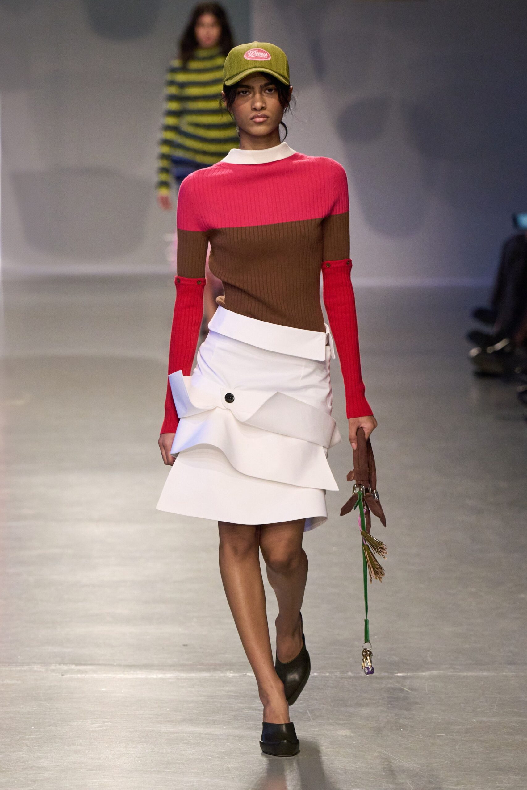 color-blocked fitted top and pleated skirt