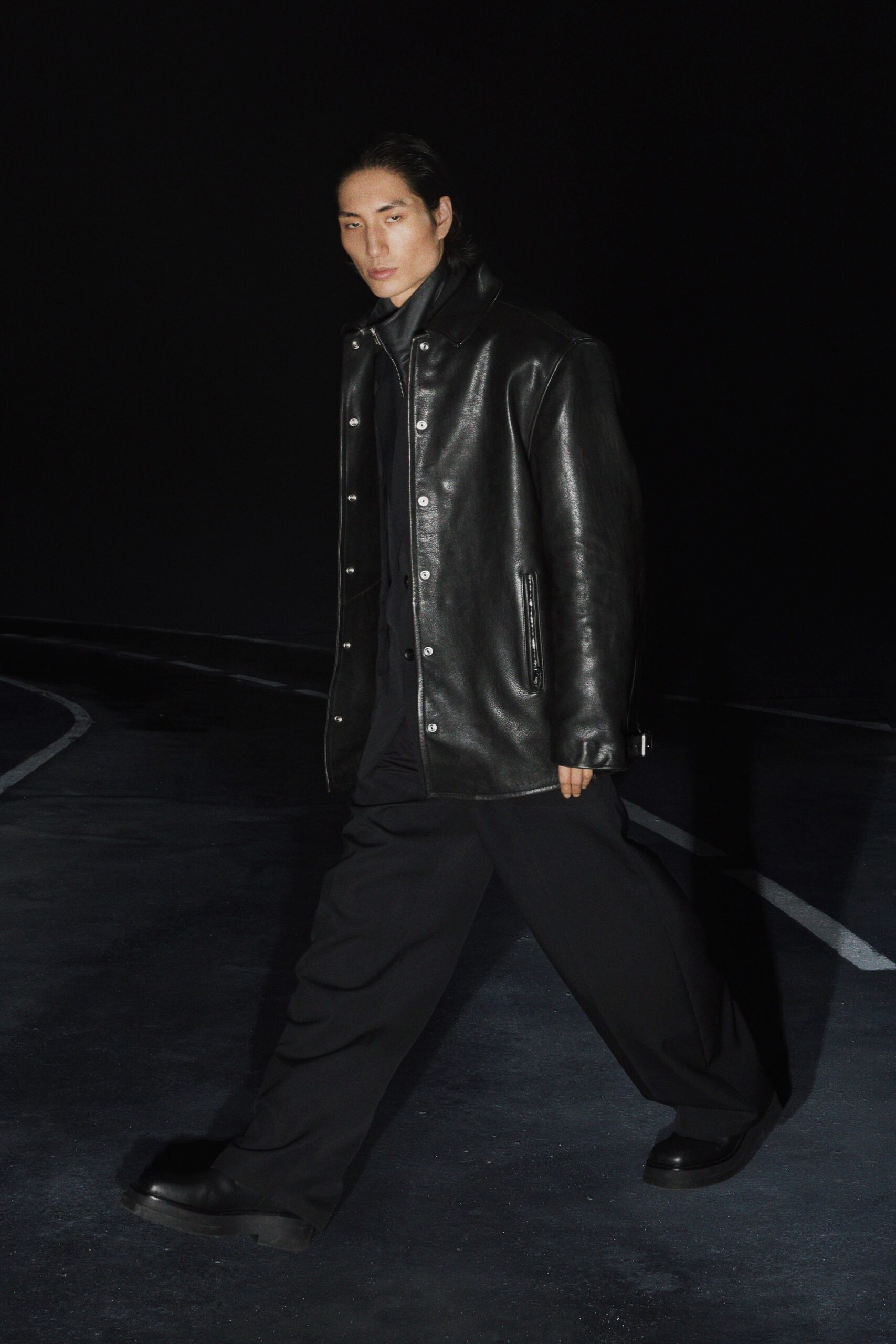 black leather long-sleeve collared relaxed coat