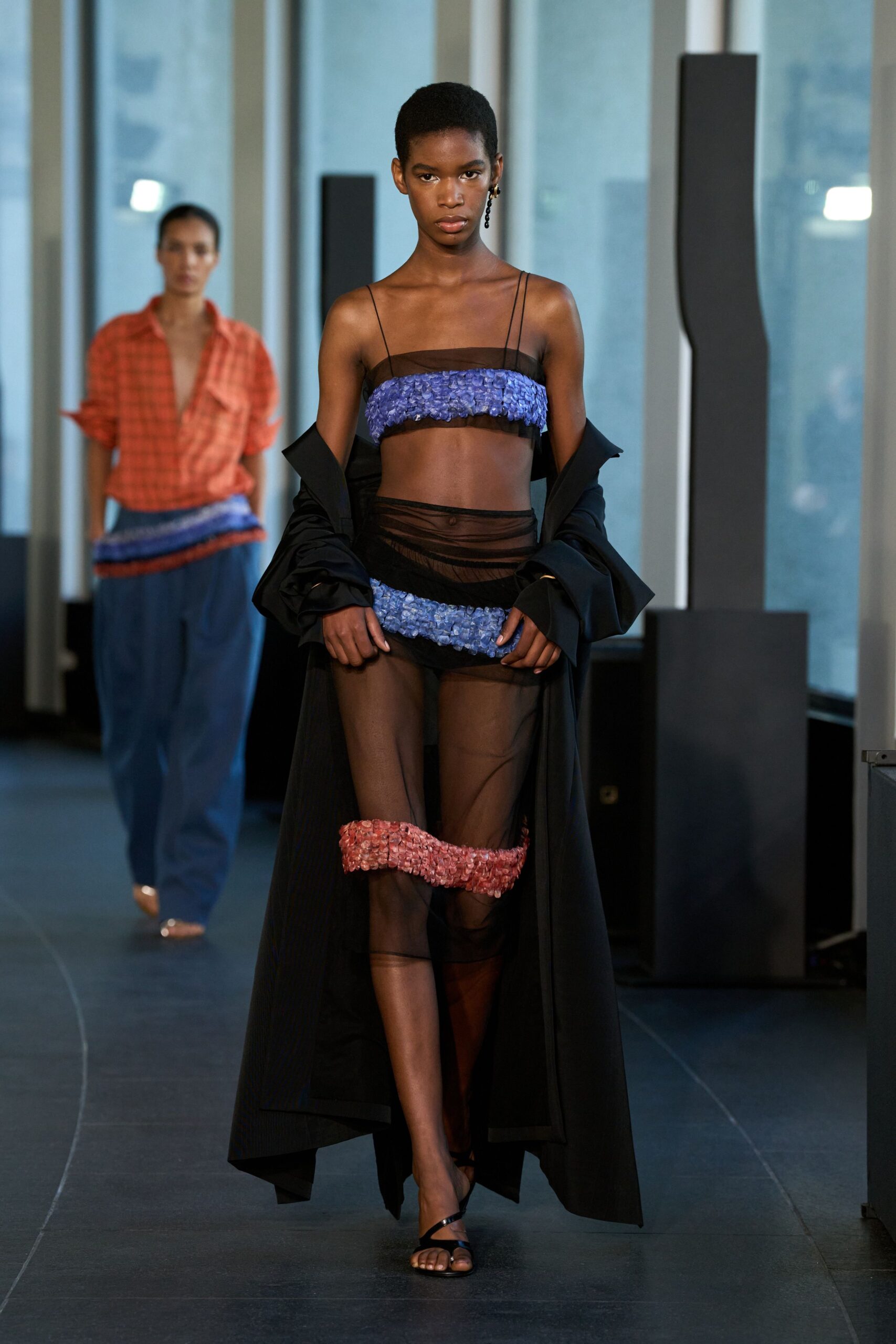 black coat with blue top