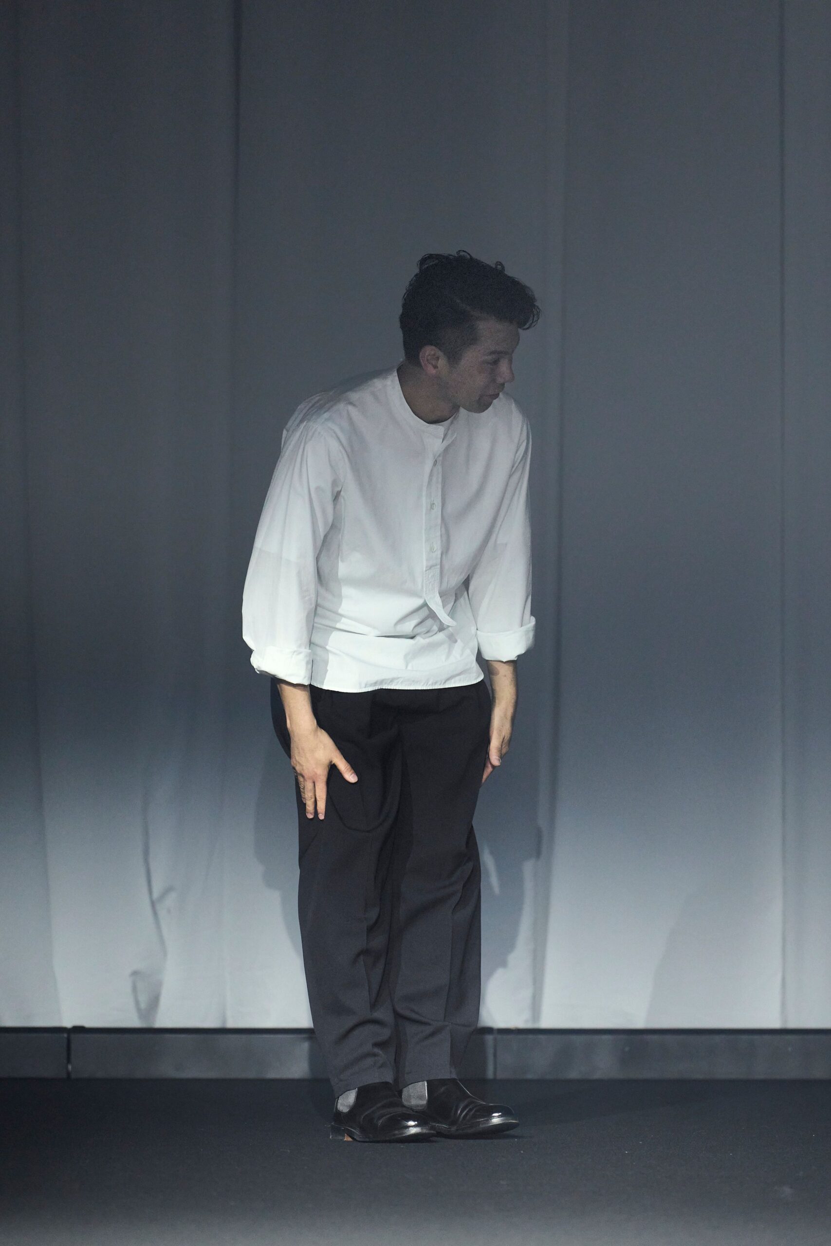 white relaxed shirt black tailored pants