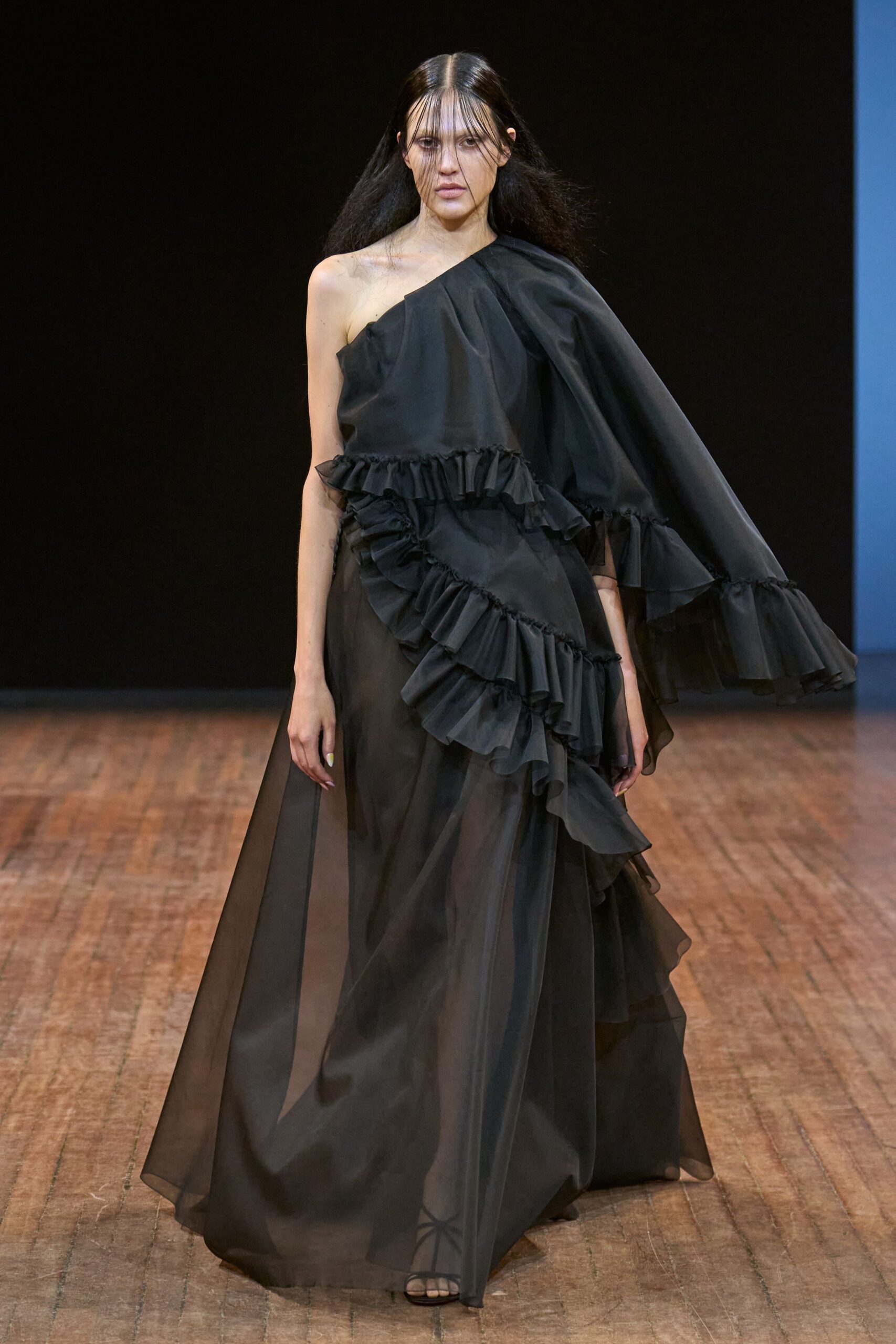 black chiffon sleeveless v-neck fitted ruffled draped gown