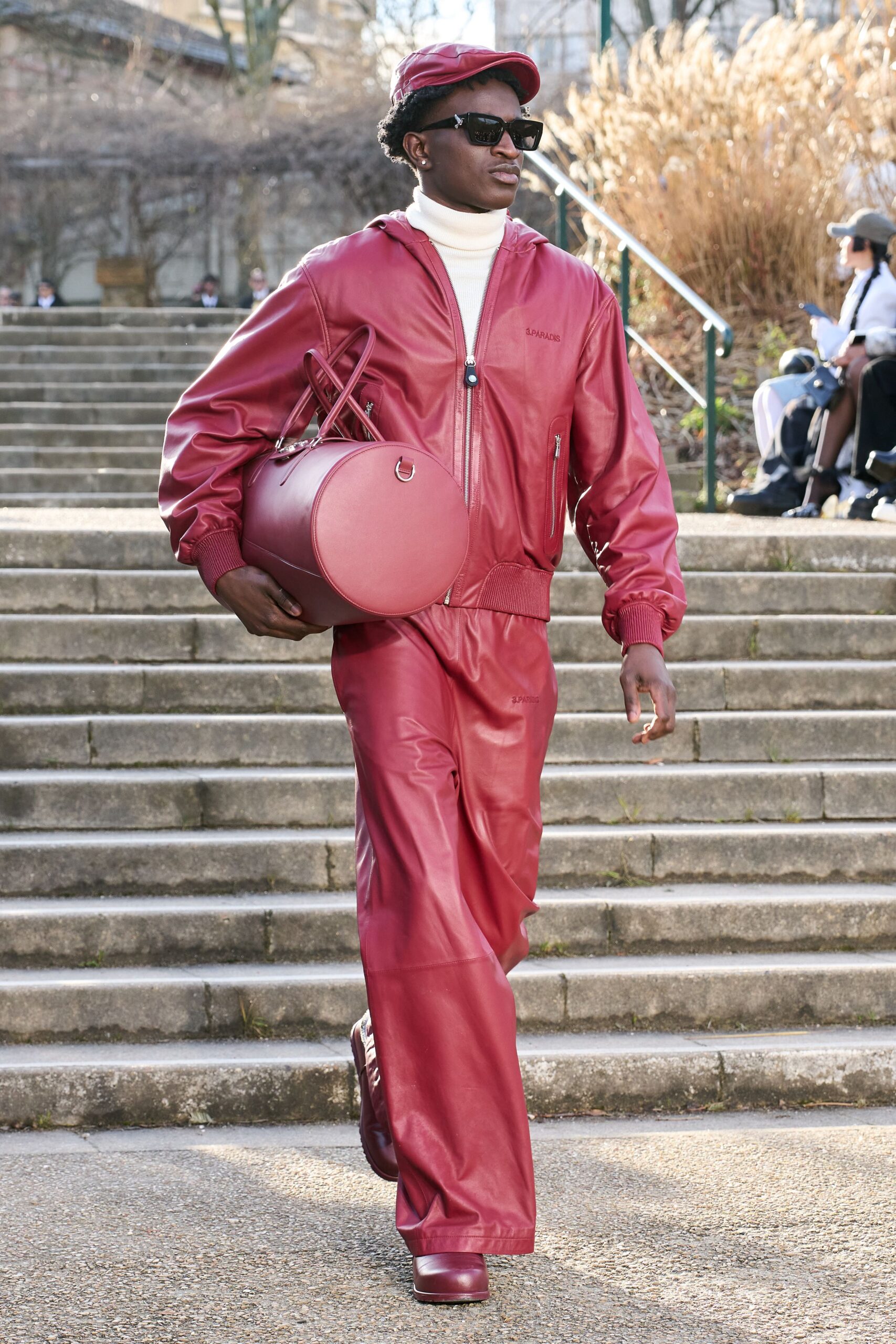red leather long-sleeve collared fitted zippered jacket