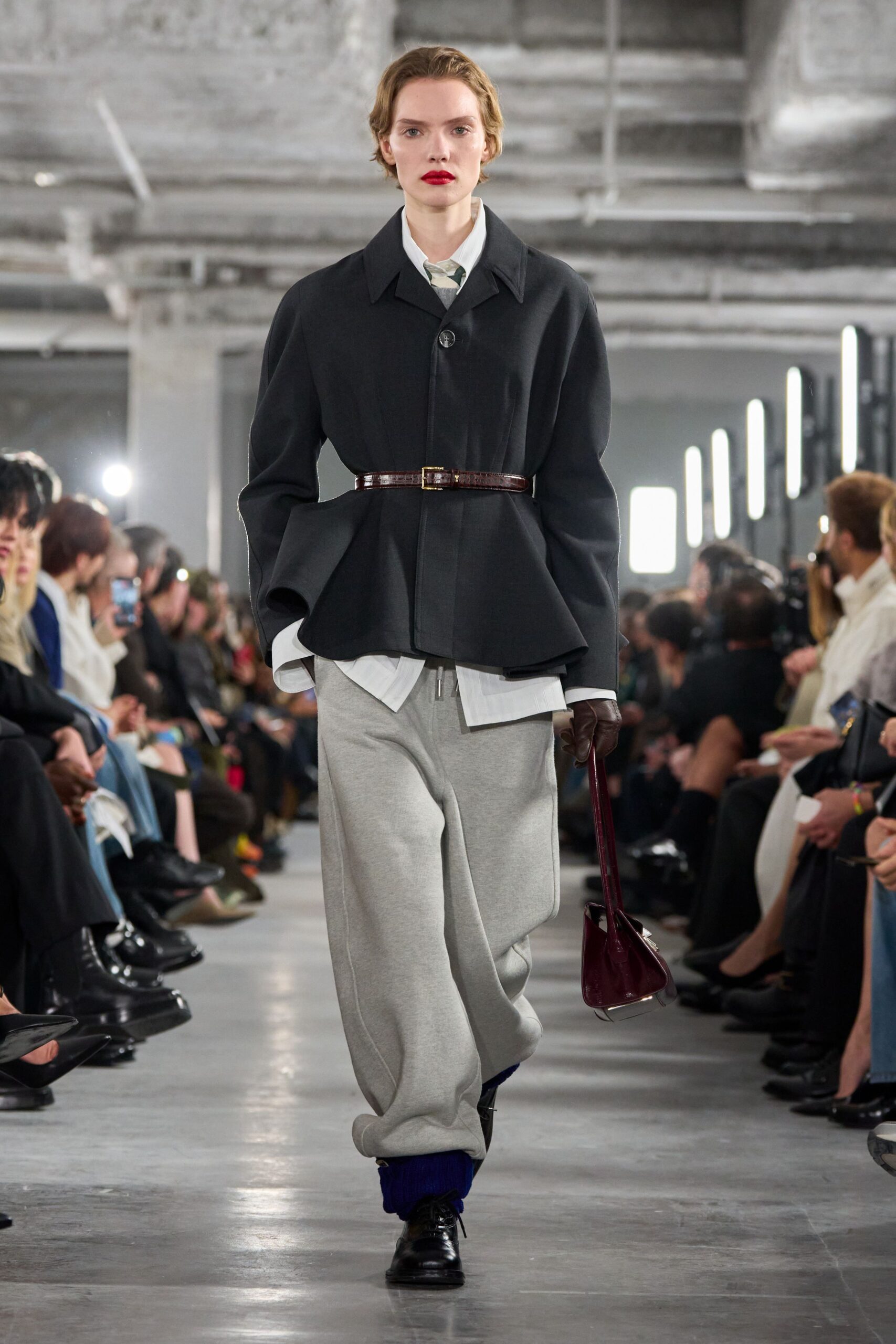 black structured jacket with gray pants