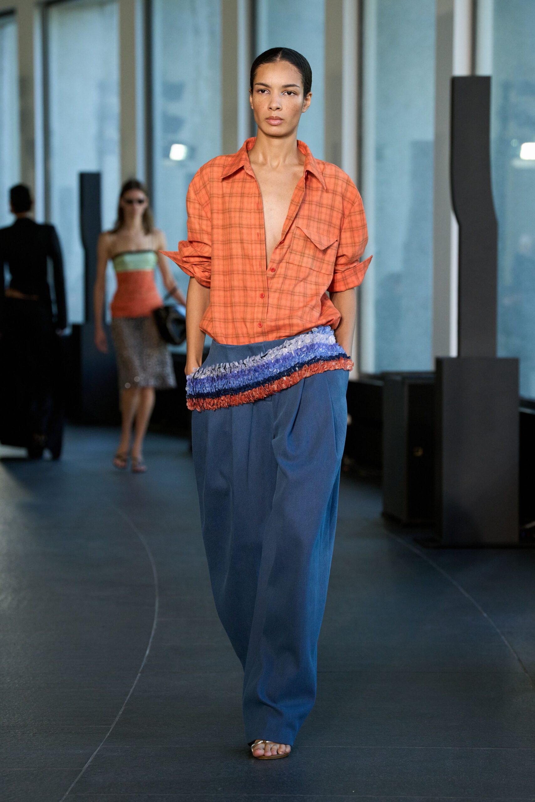 orange checked shirt with blue pants